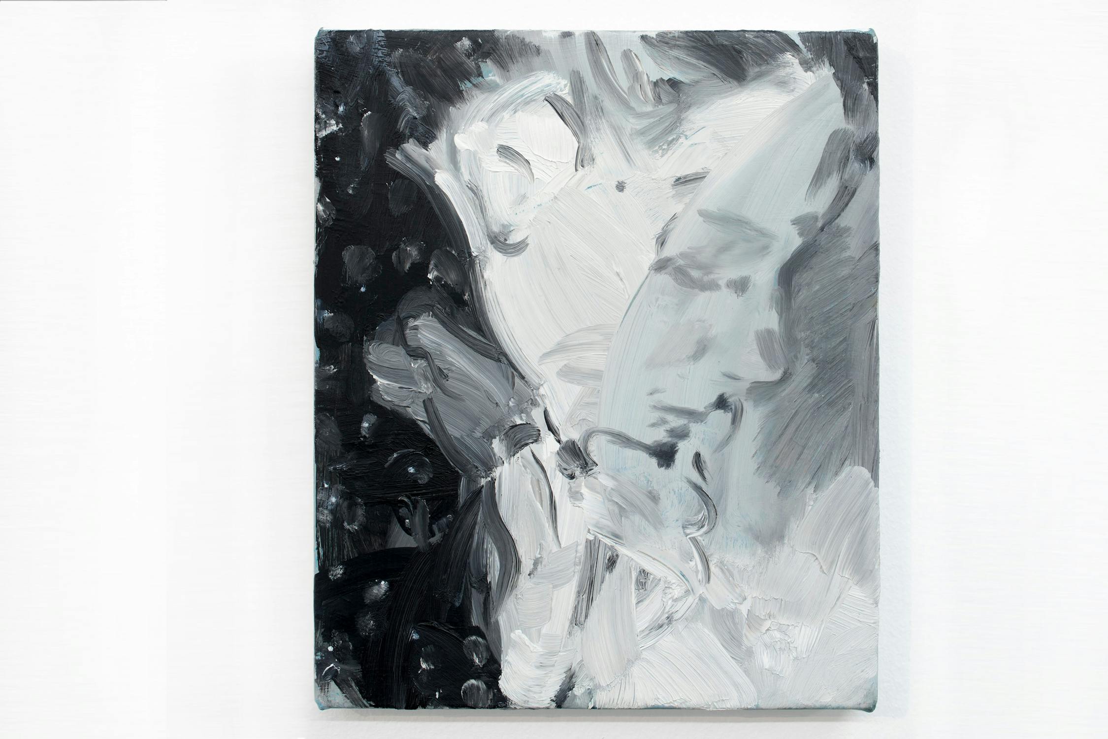 A small abstract painting in grayscale with bold, swirling brushstrokes blending light and dark shades. The composition creates an impression of dynamic movement and contrast.