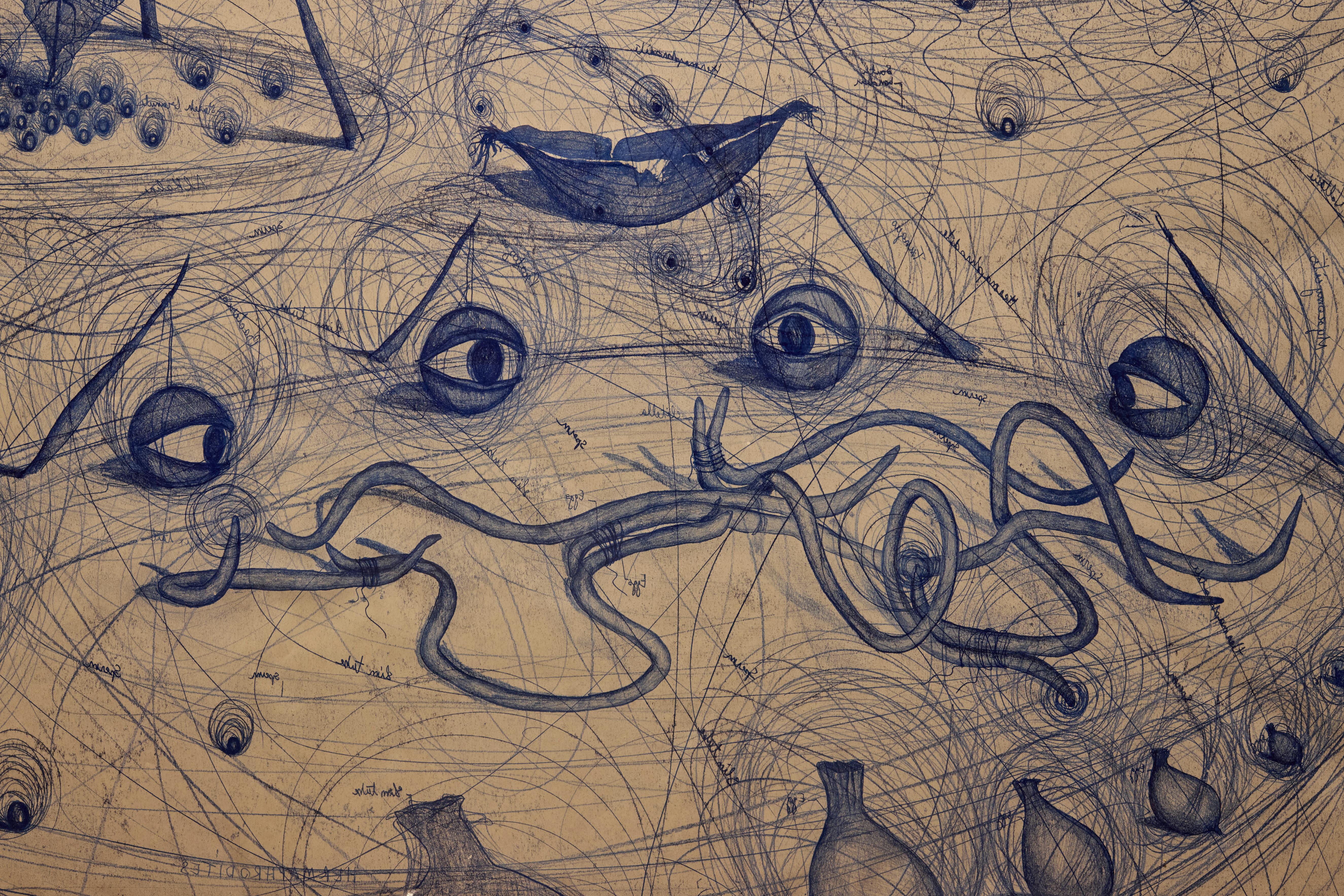 A close up of a drawing of eye and worms in blue ink. Scribbled lines run across the drawing.