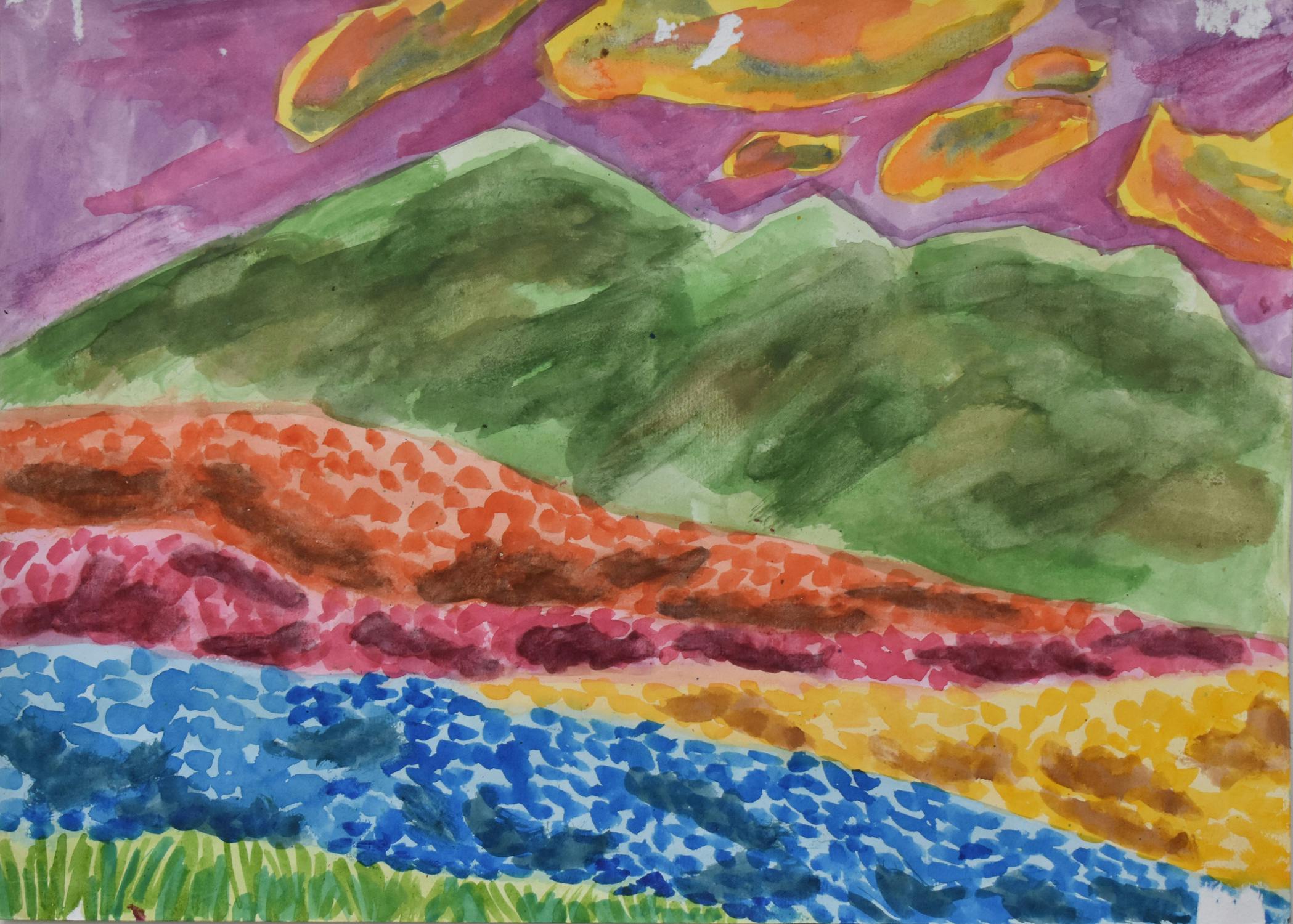 A vibrant watercolour landscape by Donald Fasanya, showing green mountains under a purple sky with orange clouds. The foreground has colourful hills with patches of red, yellow, blue, and green, suggesting fields of wildflowers or foliage. The style is bold and impressionistic.