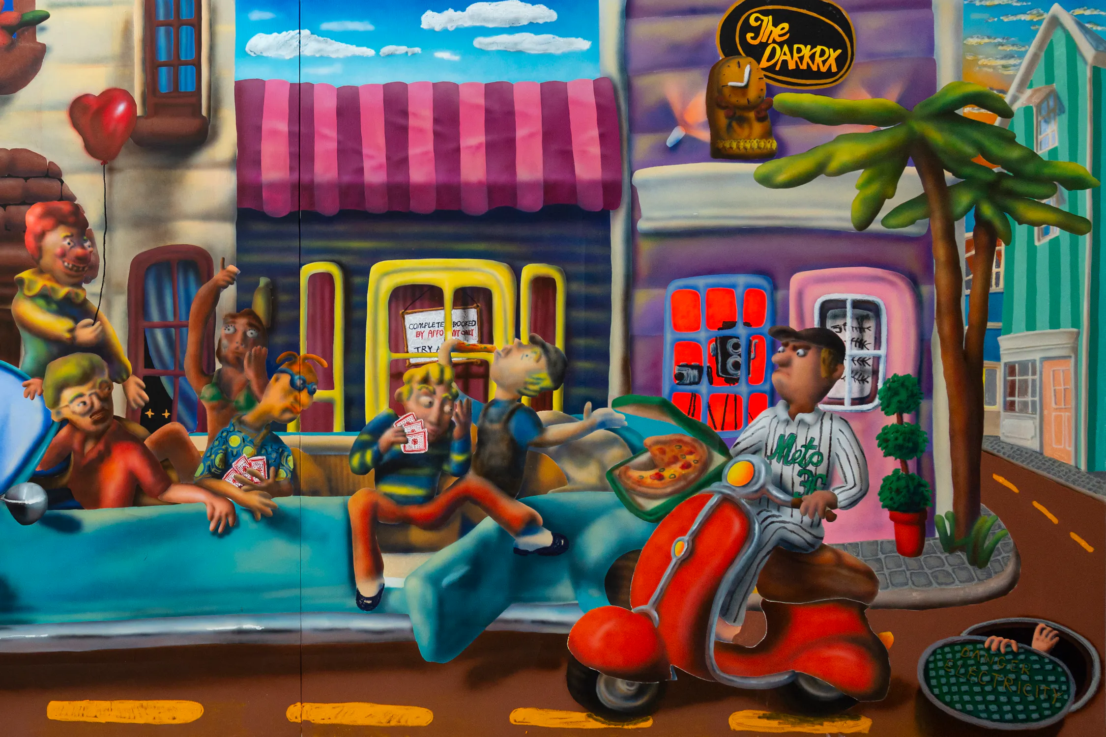 A colourful painting by Jingzhou Yan depicts cartoonish people in and around a large vintage car, a pizza delivery scooter, a police officer, and storefronts with vibrant facades on a sunny street.