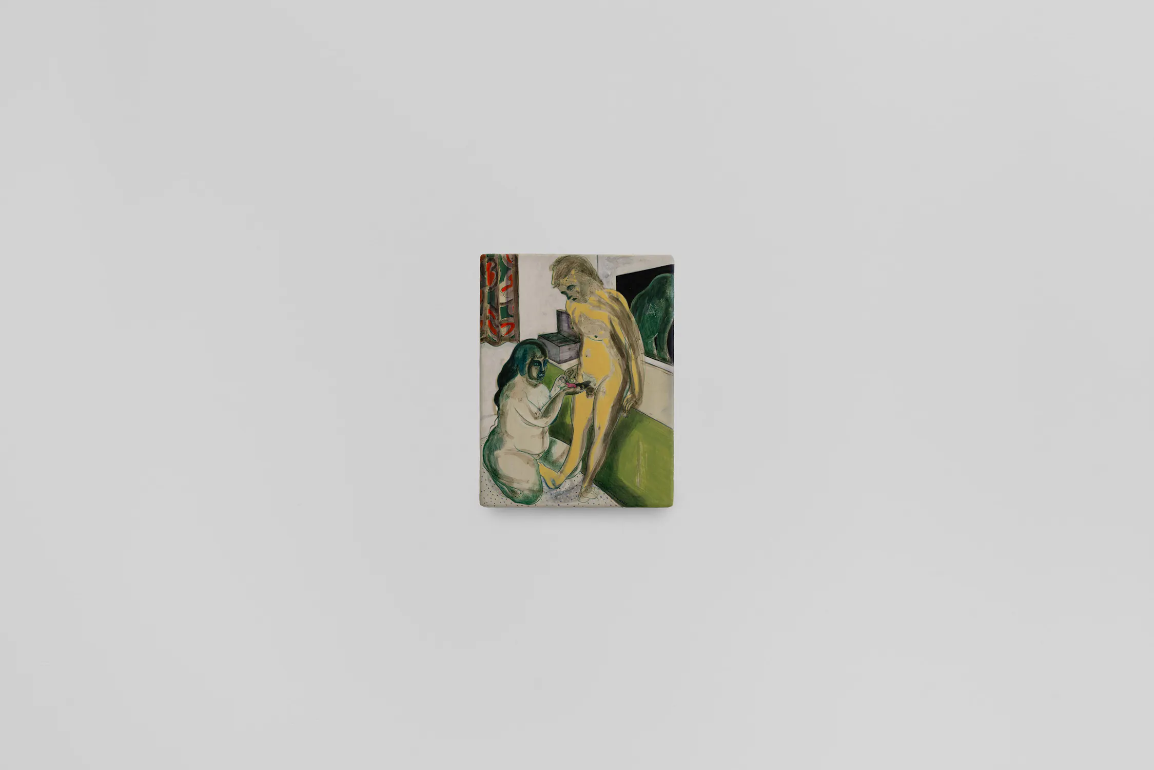 A small, colourful painting hangs centred on a plain white wall. The artwork depicts two abstract, nude human figures—one standing and yellow-toned, the other crouched and greenish—interacting in an interior space with hints of furniture.