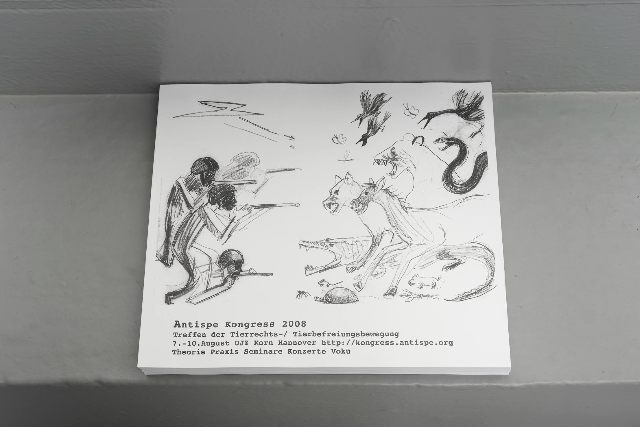 A white booklet on a grey surface displays a black pencil sketch of three armed figures facing mythical beasts, including a multi-headed dog and flying creatures. Text below reads details for "Antispe Kongress 2008" with date, location, and website link.