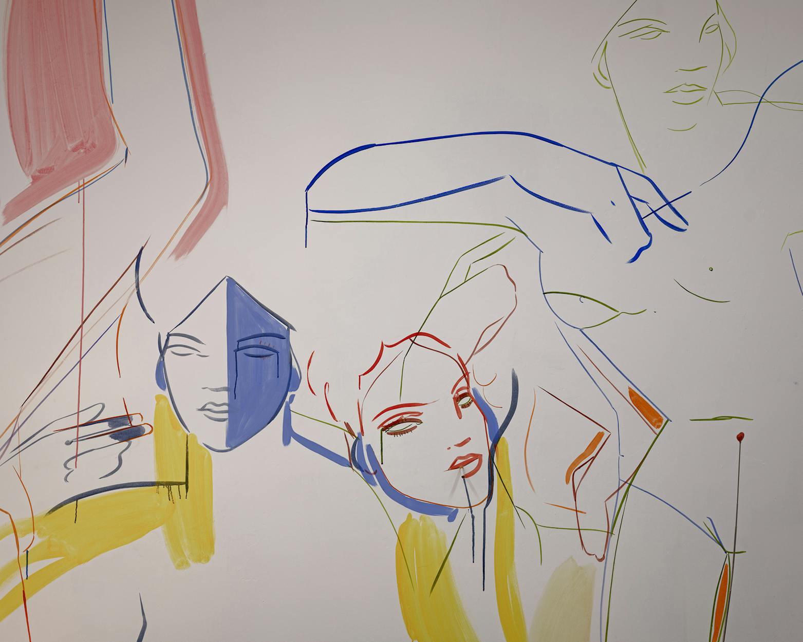 Abstract line paintings by France-Lise McGurn of three human figures with minimal facial features, outlined in blue, red, and yellow on a white background. Some areas are shaded with broad strokes of colour, giving a dynamic, expressive feel.