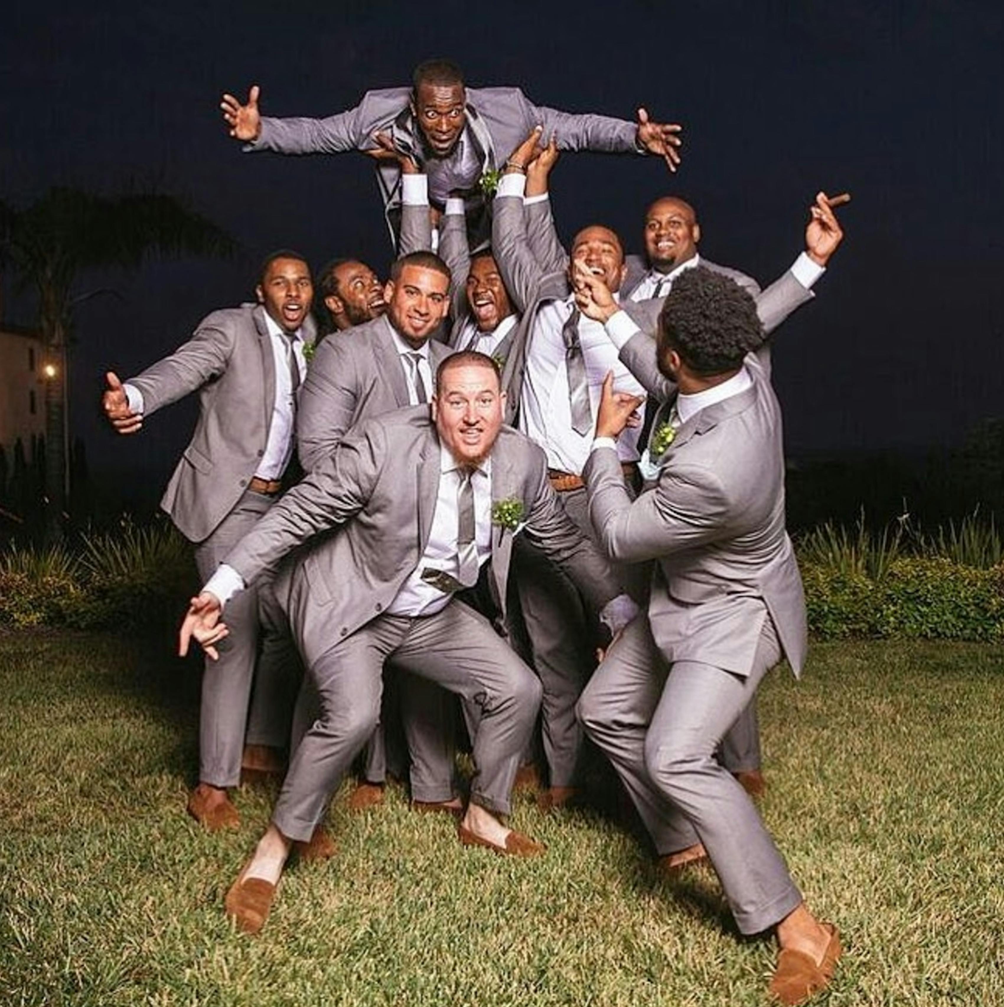 NFL's Kam Chancellor in gray groom wedding suit