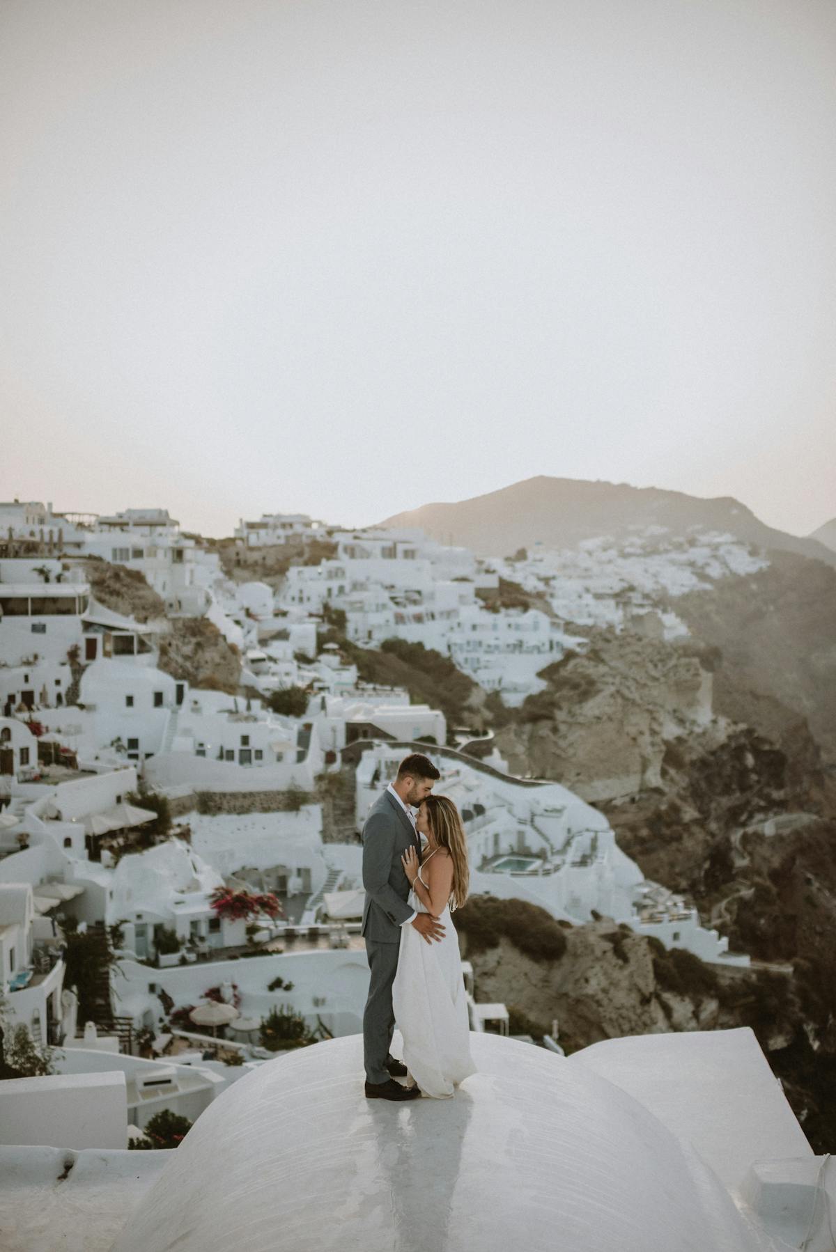 Destination Elopement in Santorini Greece Wearing Light Blue Suit by SuitShop