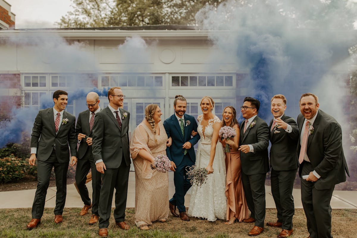 Grey suits and brown shoes are a classic choice for weddings.