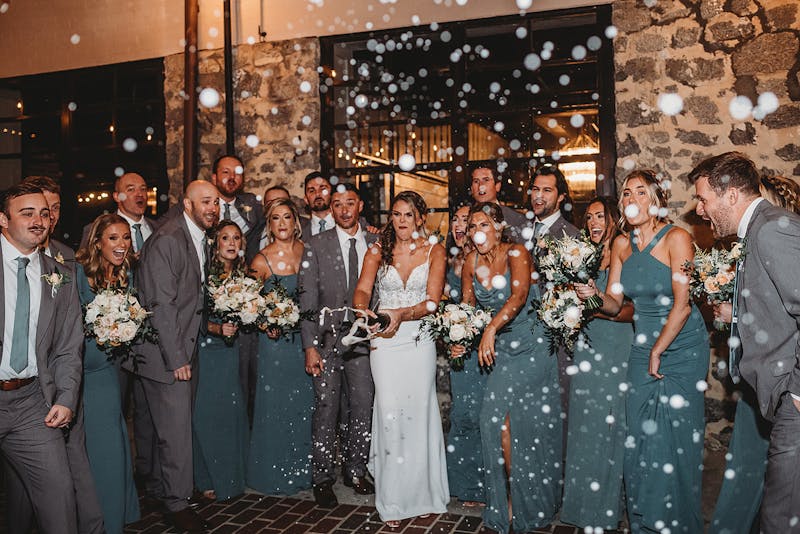 green and gray wedding party attire