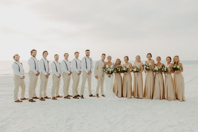 tan suits for a beach wedding