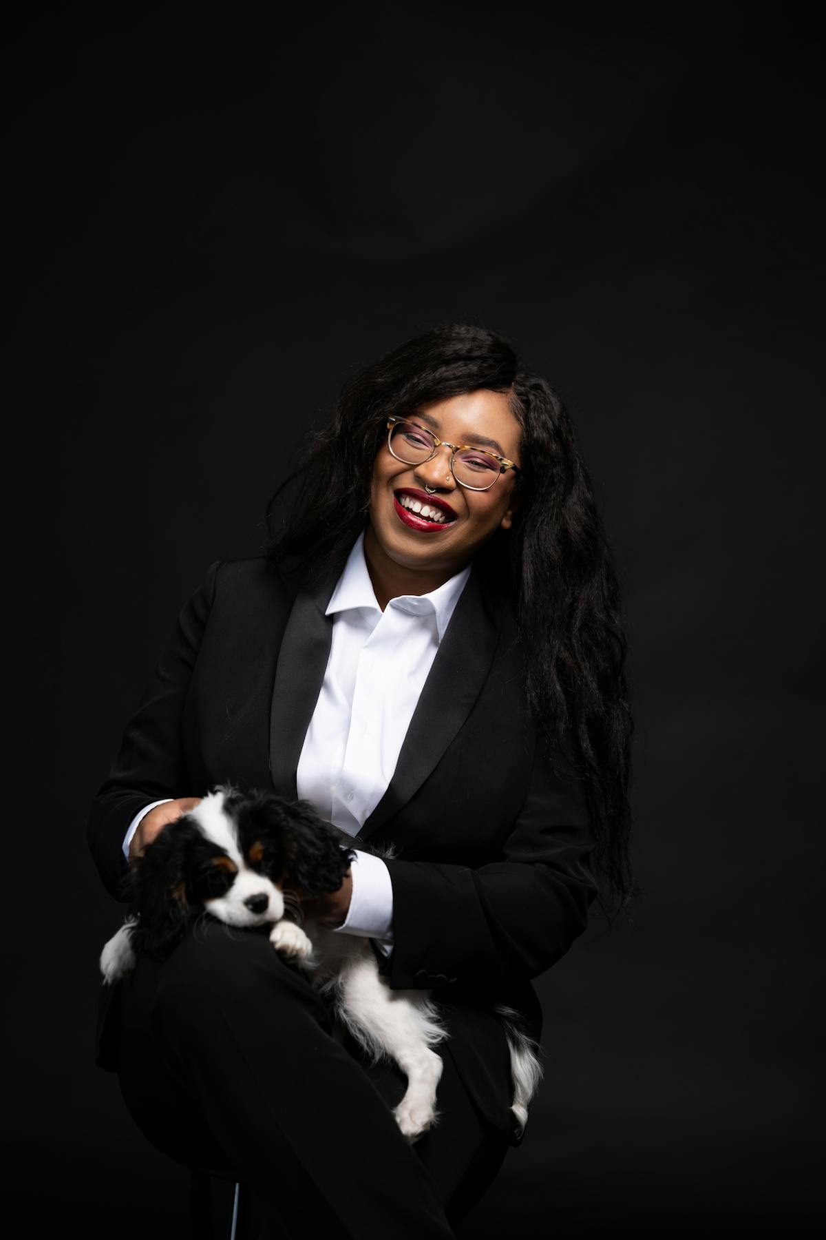 Women's Black Tuxedo on Female Founder of Healthy Roots Dolls, Yelitsa Jean-Charles