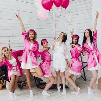 Bachelorette party girls night with pink robes