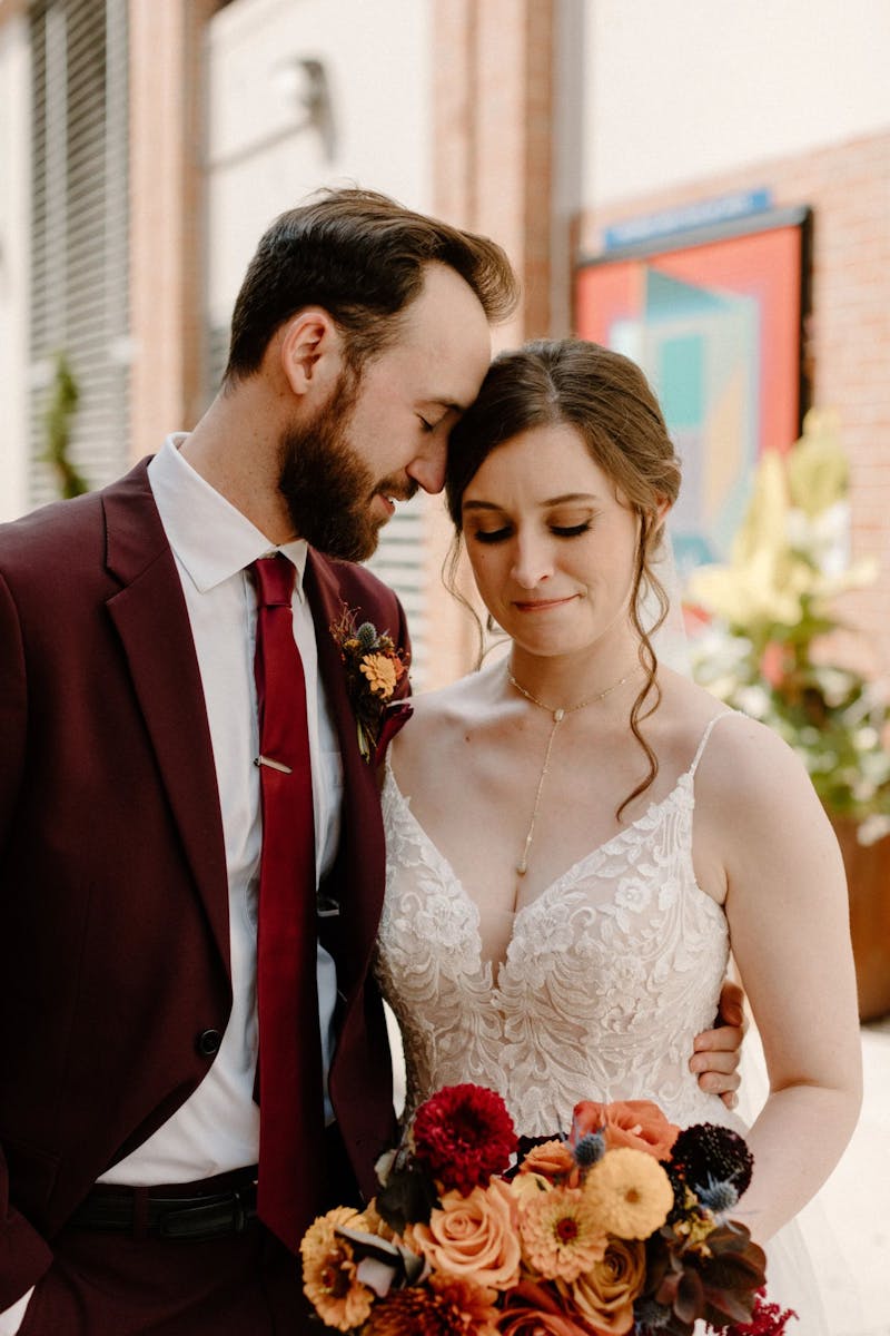 maroon groom suit for colorful fall wedding