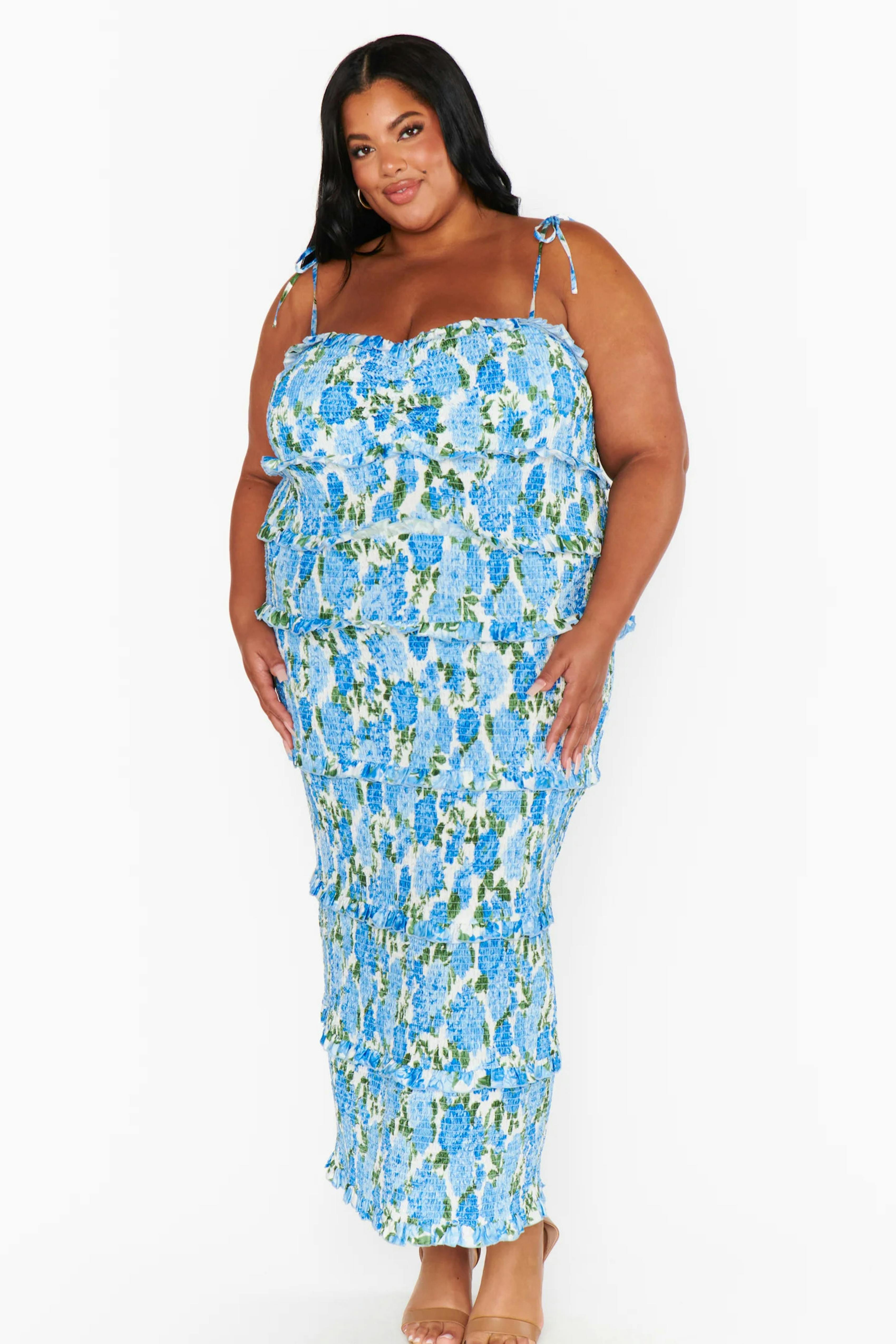 White and blue smocked cottage floral midi bridesmaid dress.