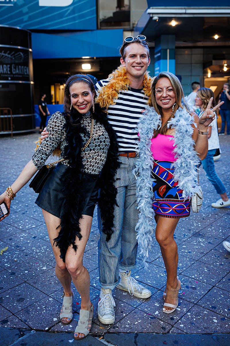 Fans outside Madison Square Garden in concert outfits and feather boas for Harry Styles Love on Tour