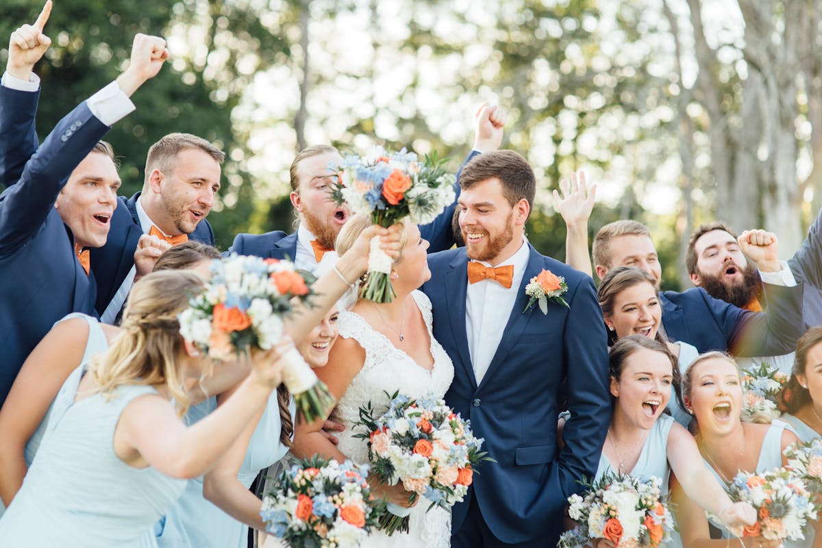 Groomsmen in navy blue wedding suits for men