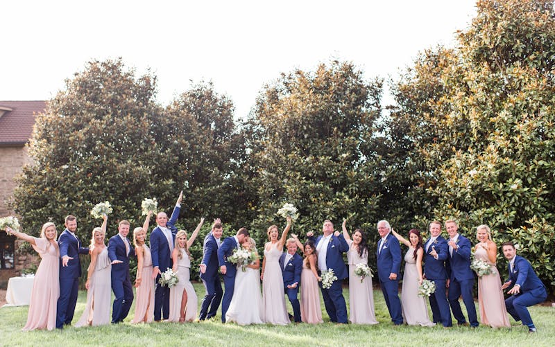 Groomsmen in bright blue wedding suits for men