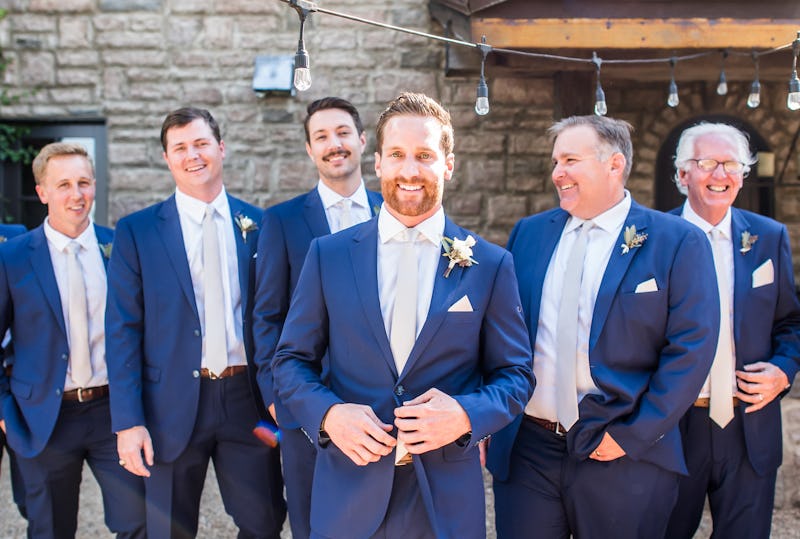 Groomsmen in bright blue wedding suits for men