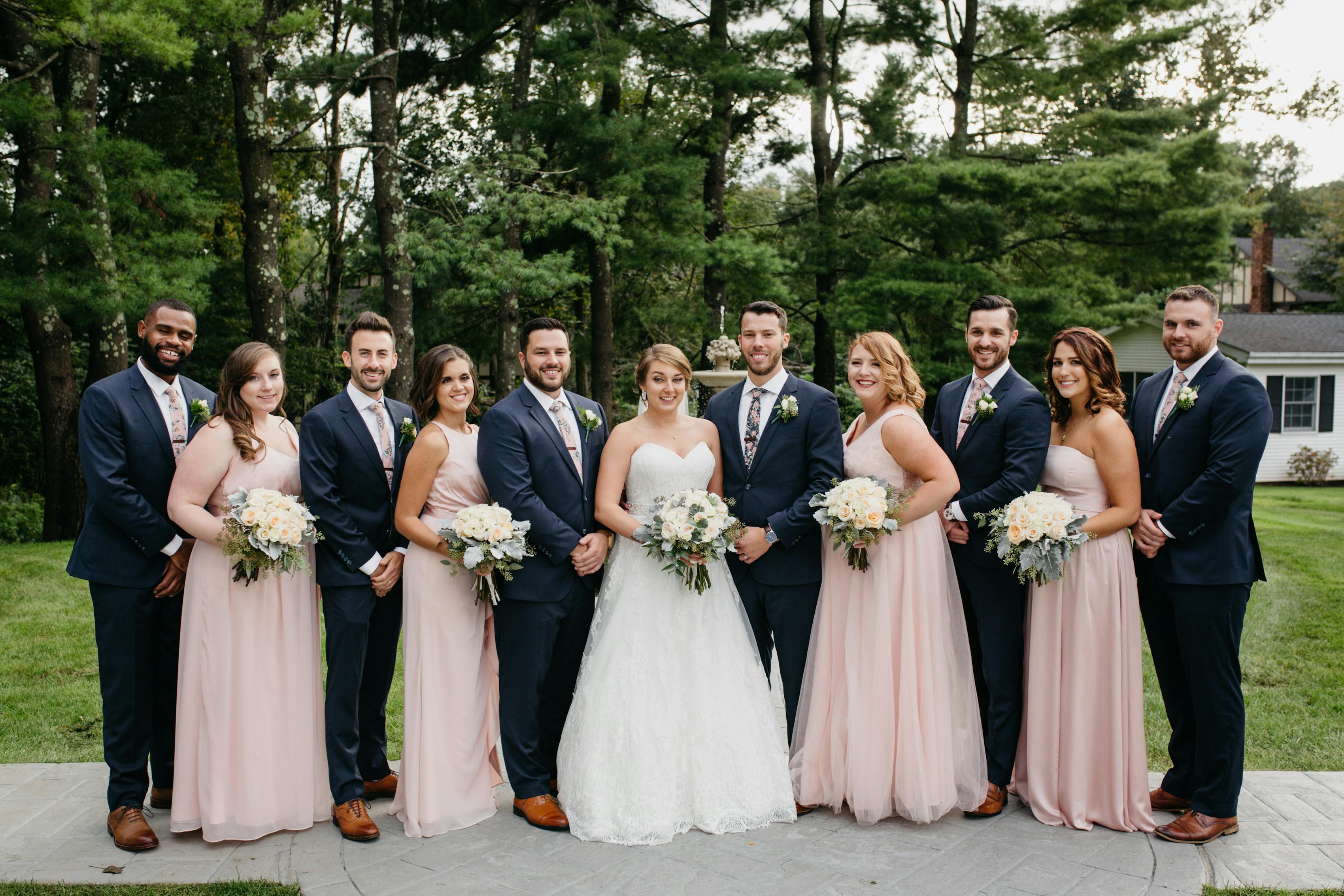 Groom in navy blue wedding suit