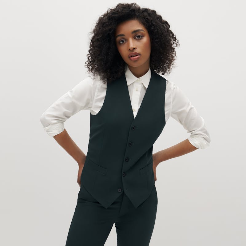 Streetstyle homecoming 2022 look with women's dark green suit vest coordinated set.