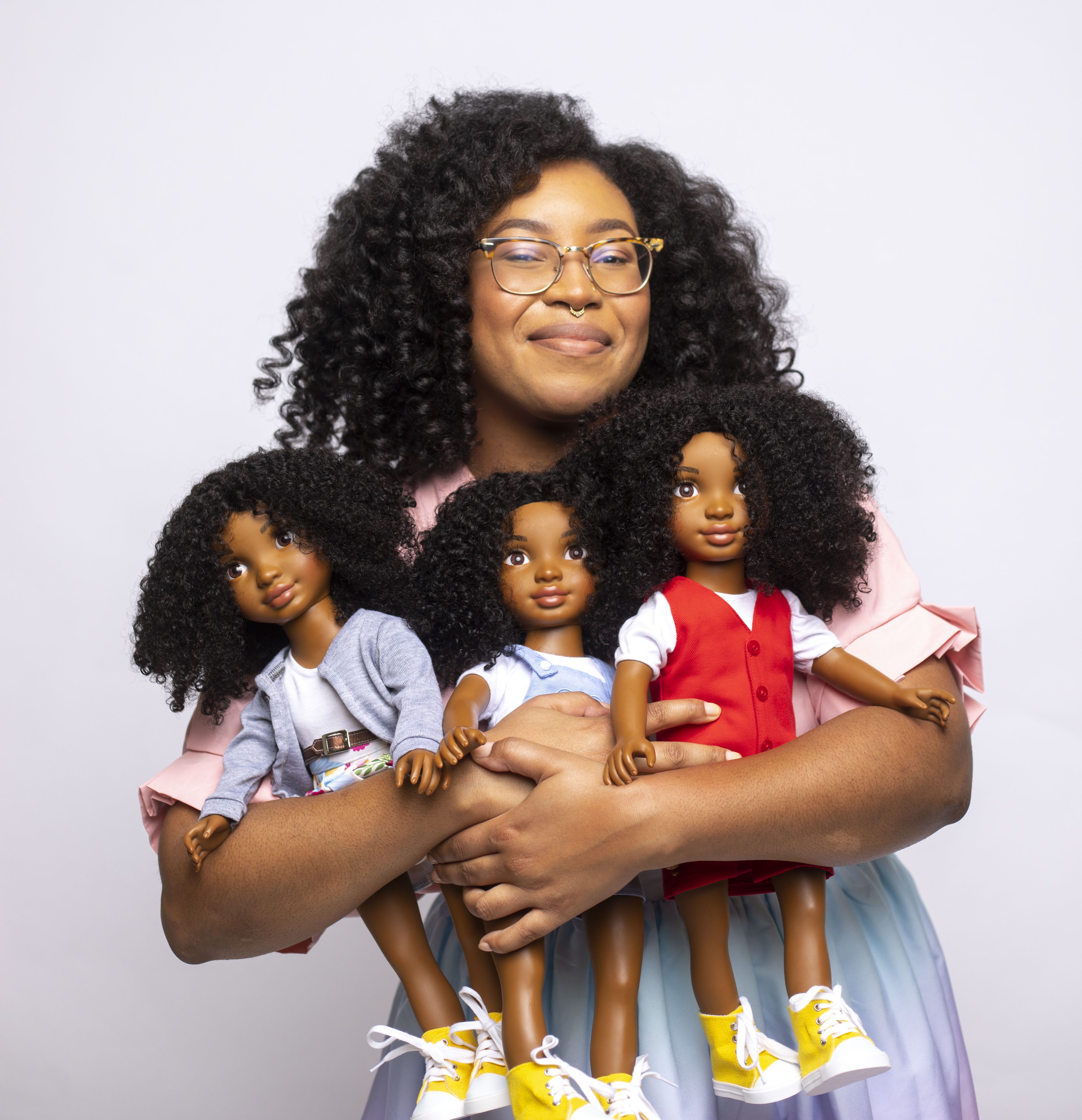 Female Founder of Healthy Roots Dolls, Yelitsa Jean-Charles. Natural curls.
