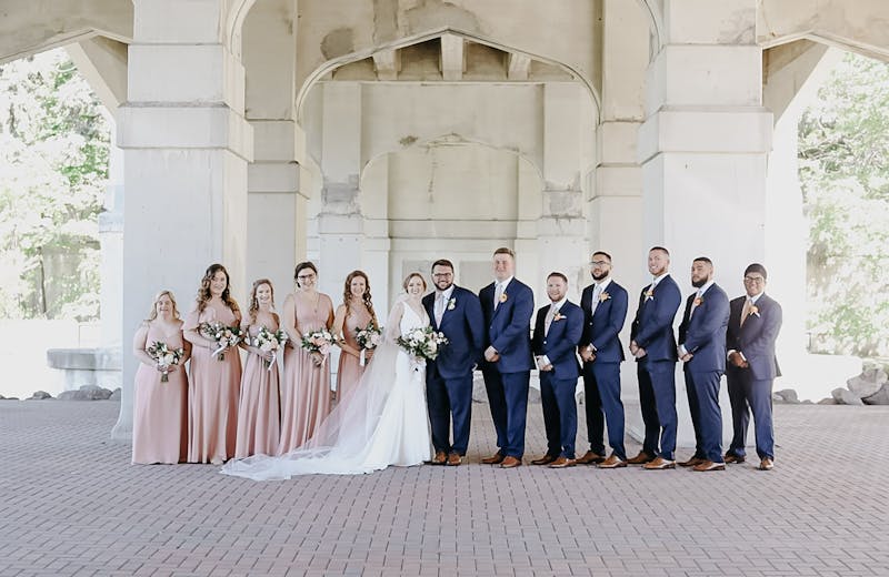 Wedding party in Navy Suits & Mauve Birdy Grey Bridesmaids Dresses