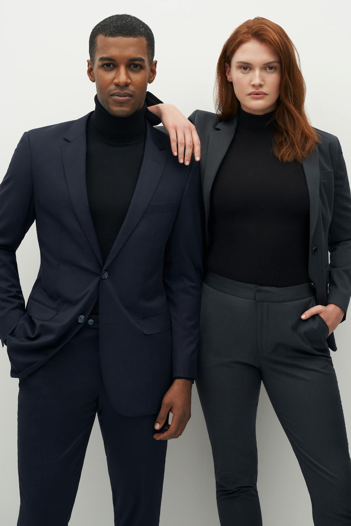 turtlenecks and suits