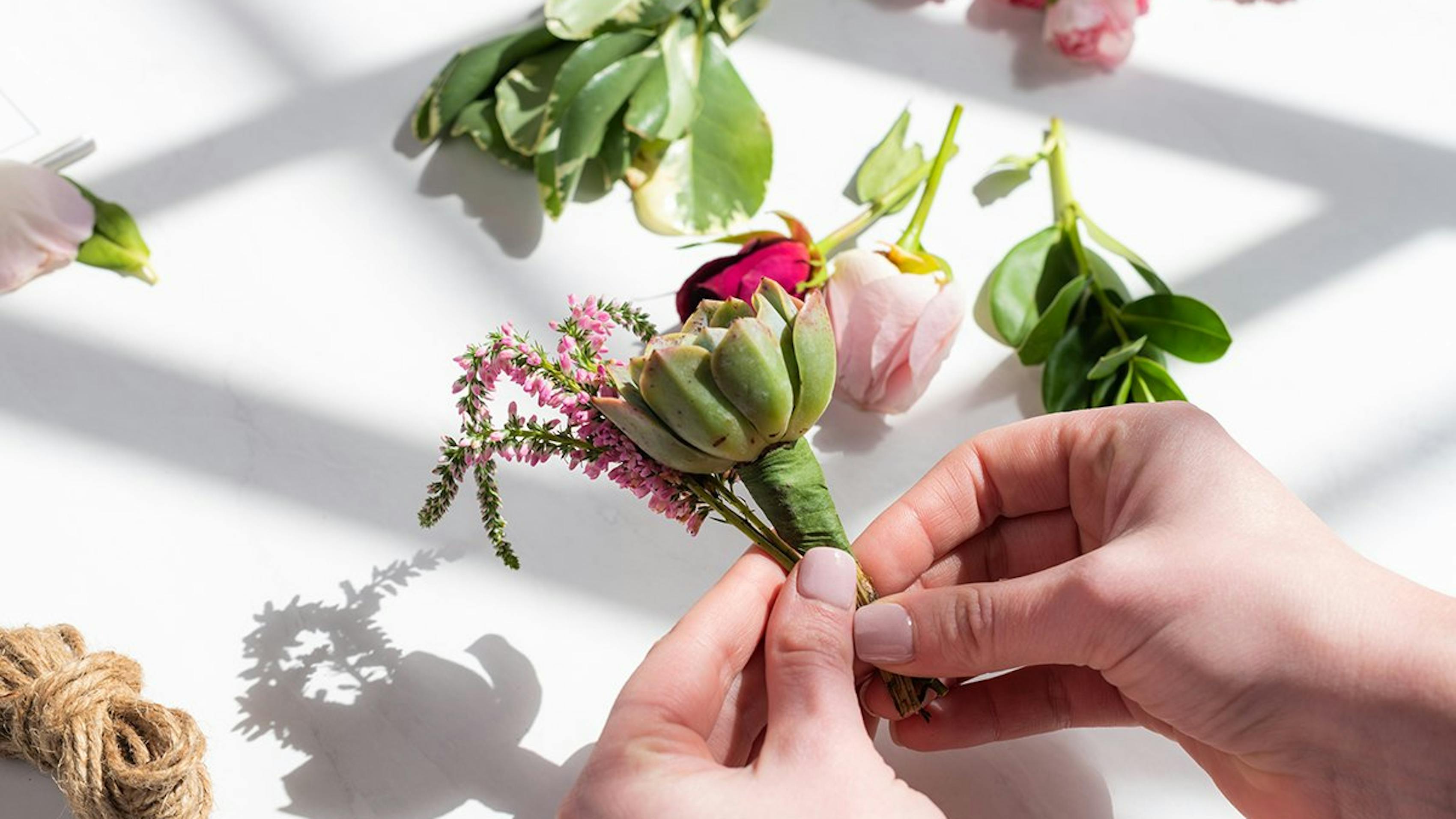 Supplies you need to make your own DIY wedding boutonniere for groomsmen.