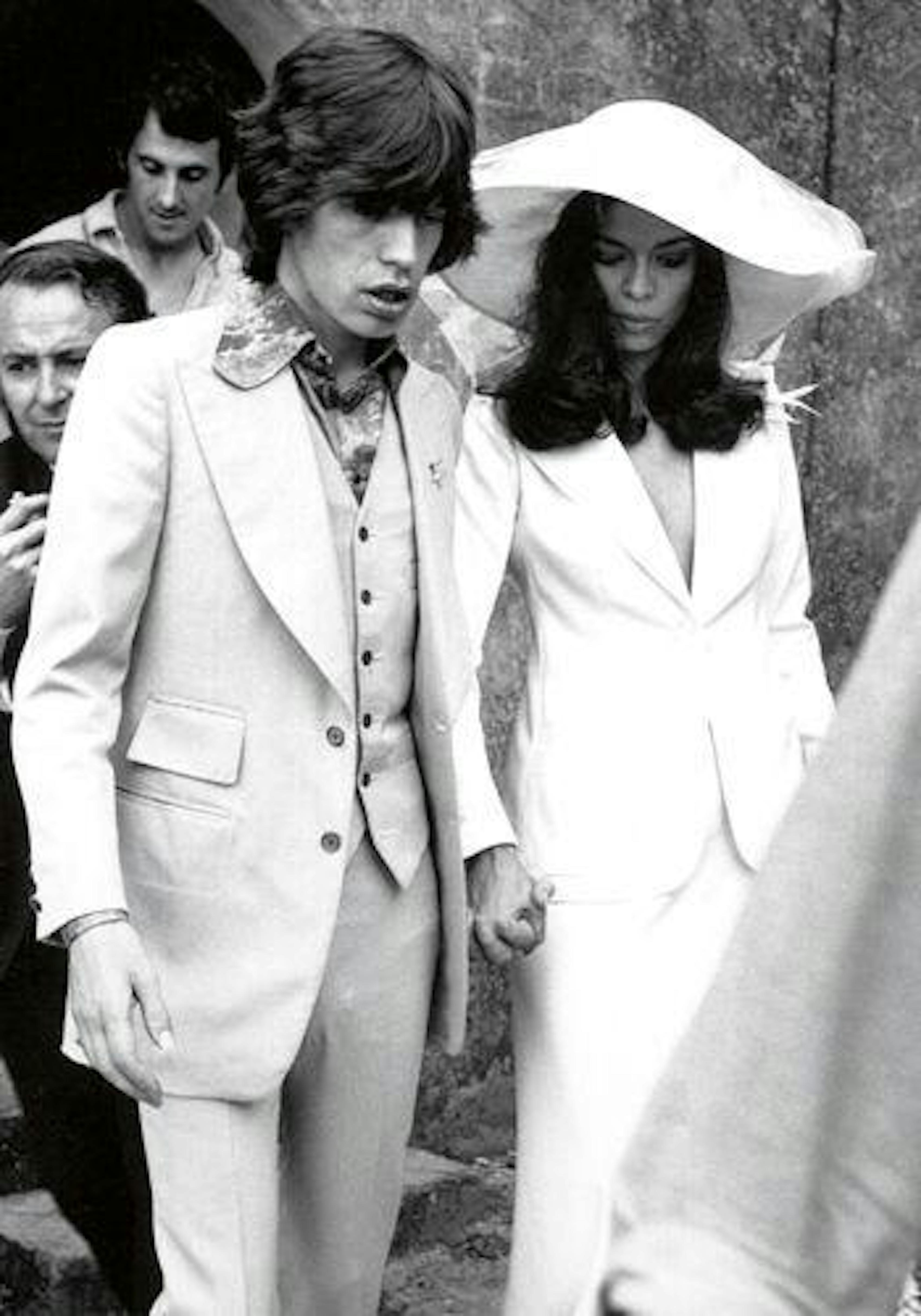history of women's wedding suits