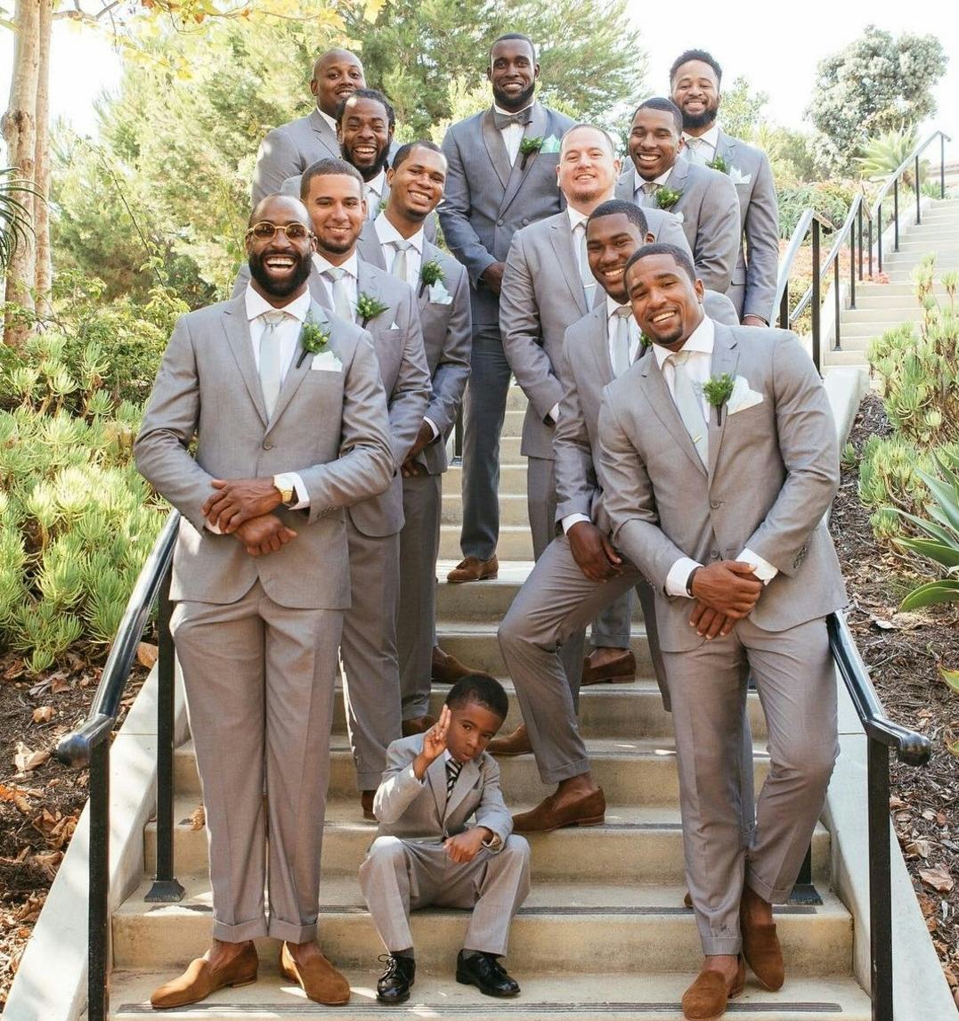 NFL's Kam Chancellor in gray groom wedding suit