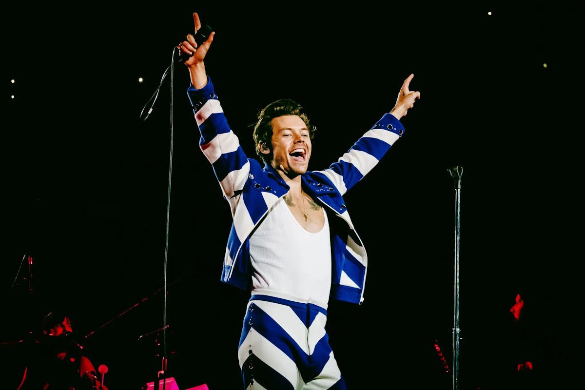 Harry Styles concert photo from Madison Square Garden is custom Gucci Love on Tour outfit.