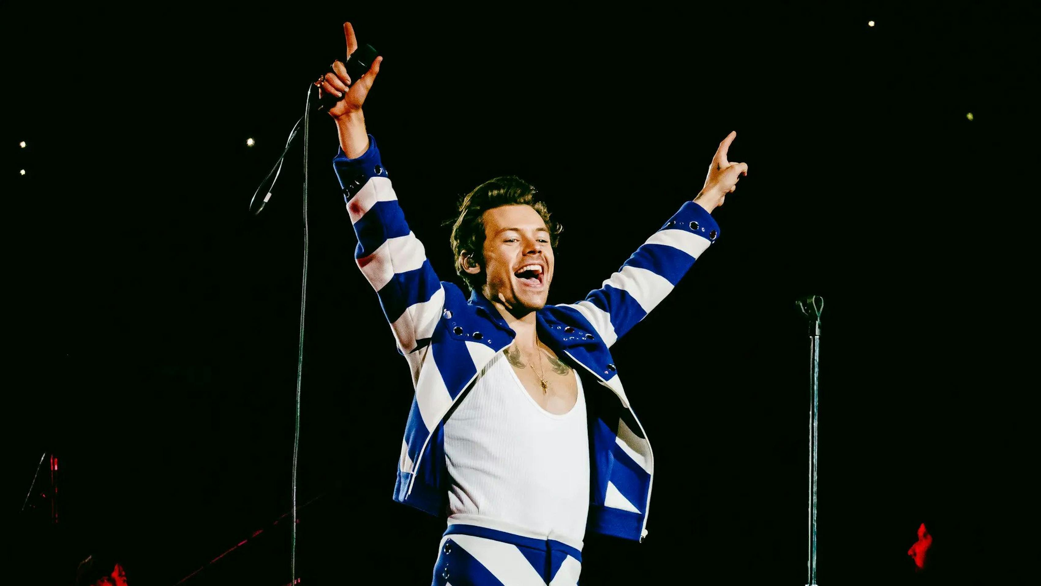 Harry Styles concert photo from Madison Square Garden is custom Gucci Love on Tour outfit.