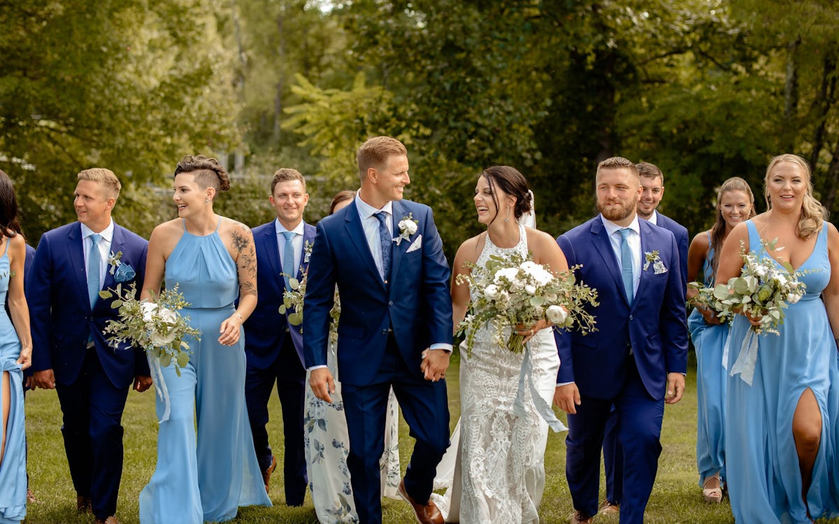 Tips on selecting the right blue suit color for your wedding party based on your bridesmaid dress