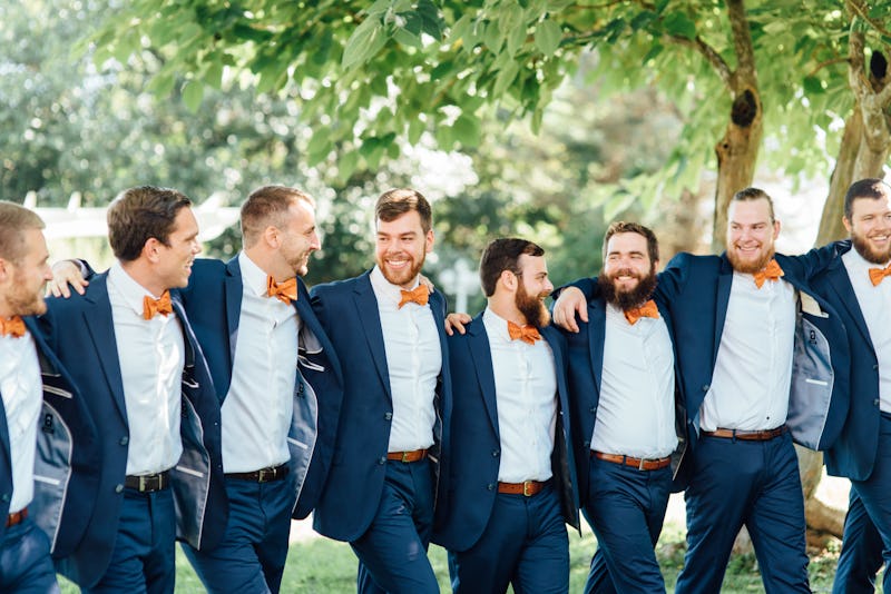 Groomsmen in navy blue wedding suits for men