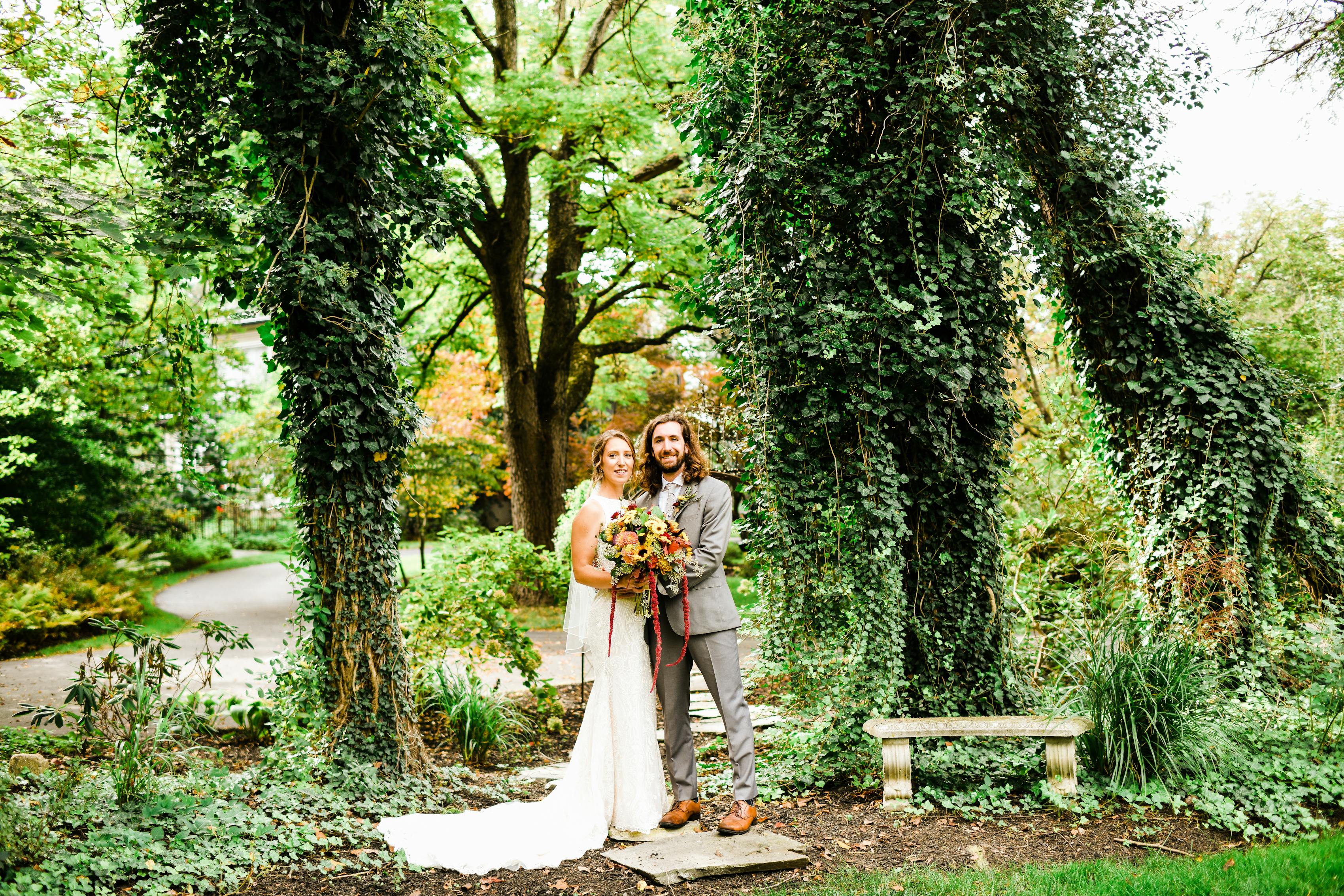 Sustainable wedding in arboretum park with natural wedding decorations