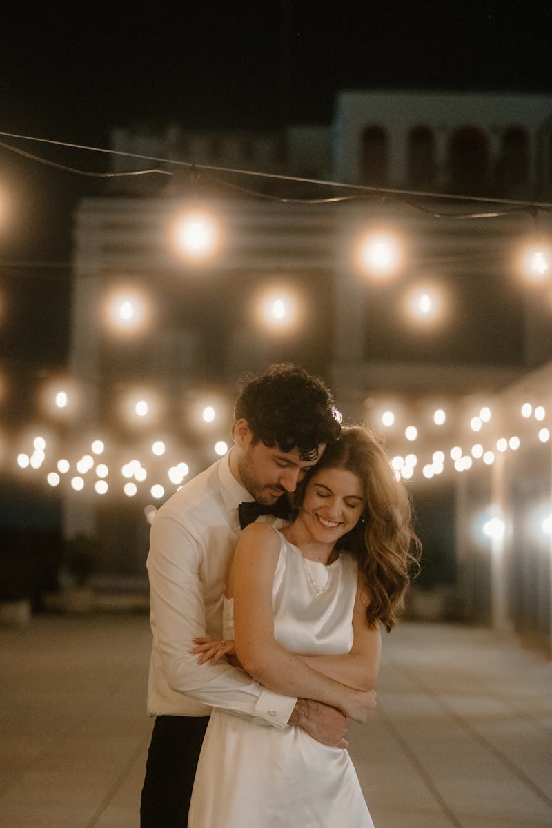 wedding reception rooftop dance party with twinkle lights