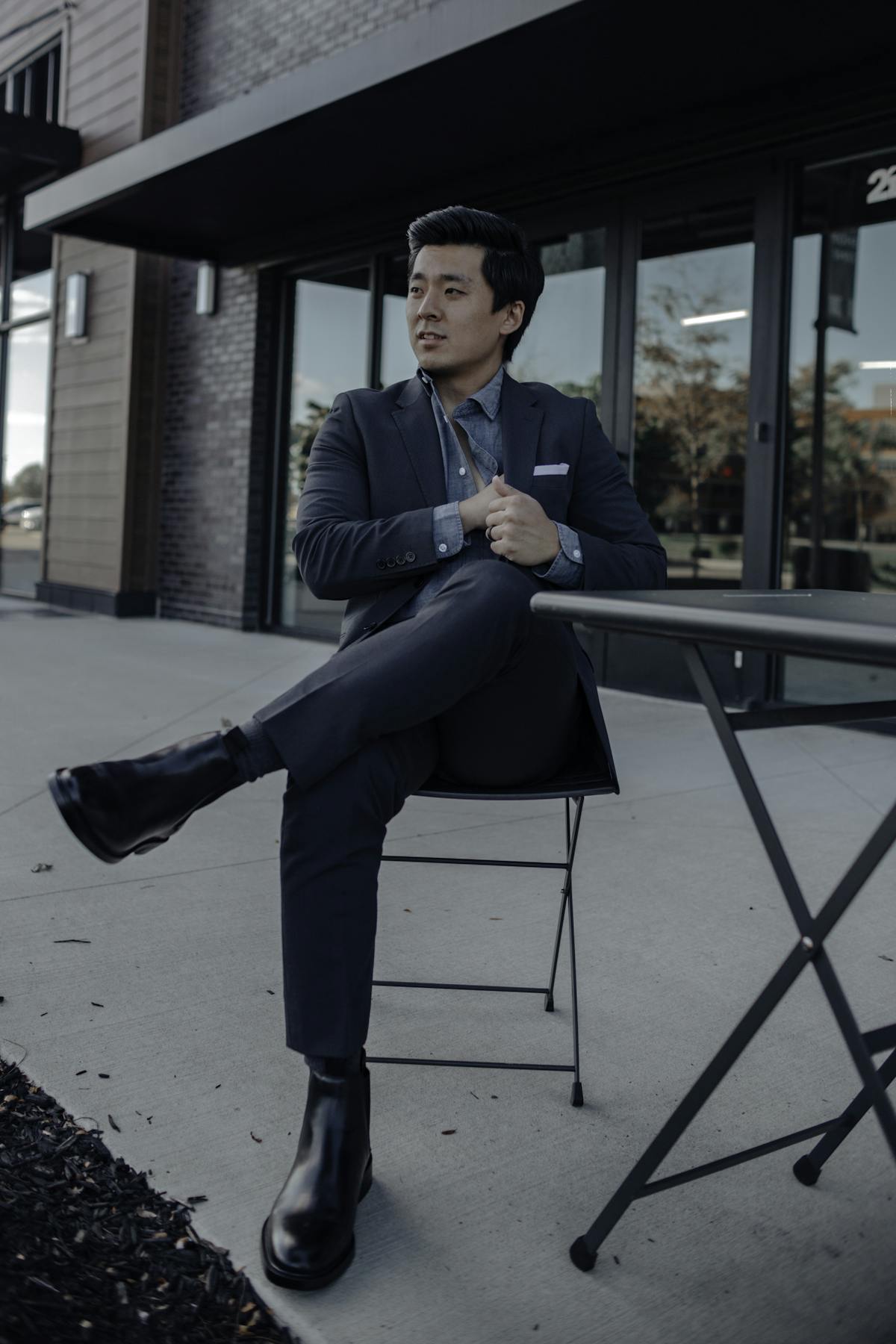 Men's professional style with dark grey suit and black Chelsea boots for work