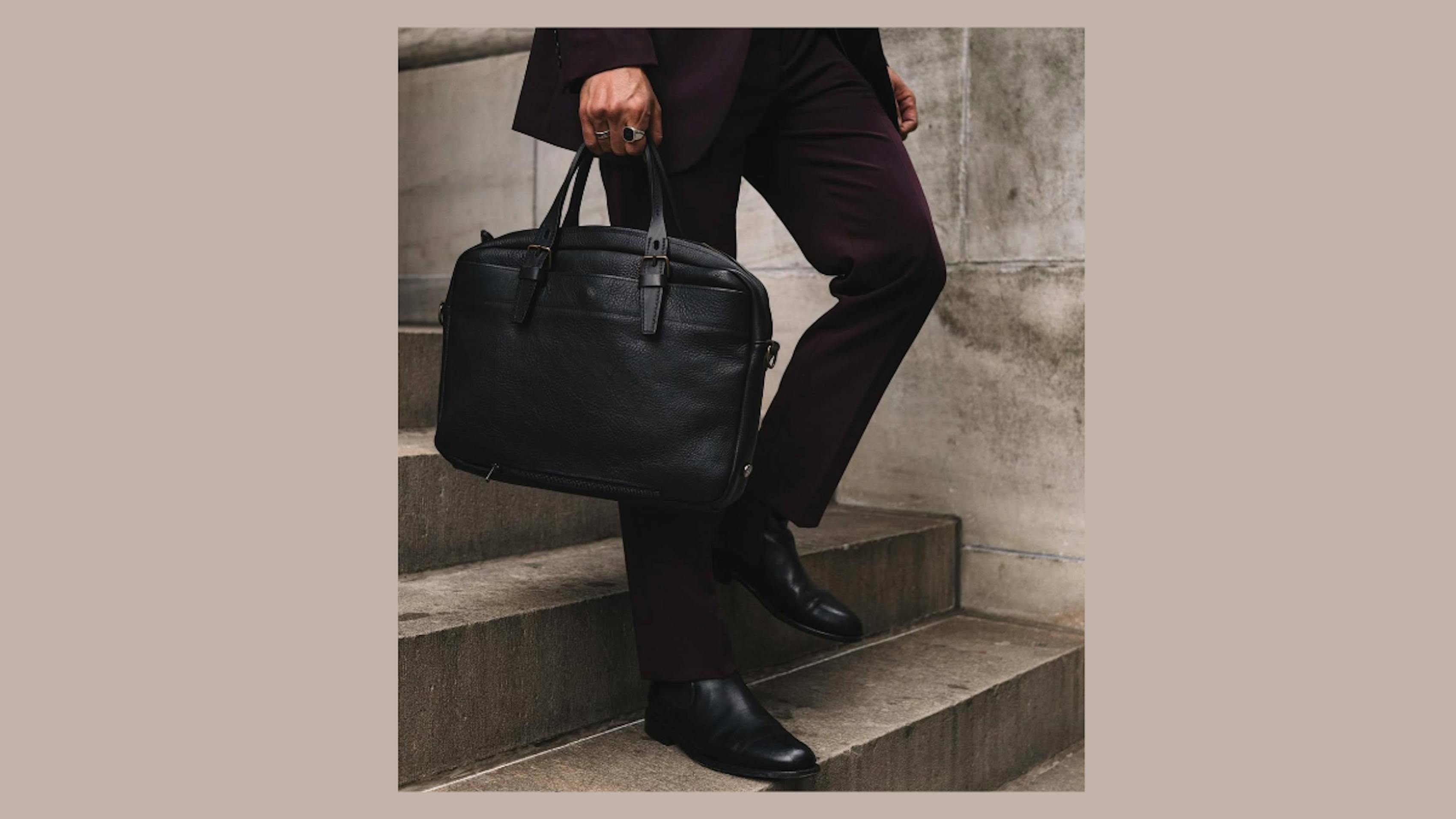 Fashionable men's business professional outfit in a suit with Chelsea boots