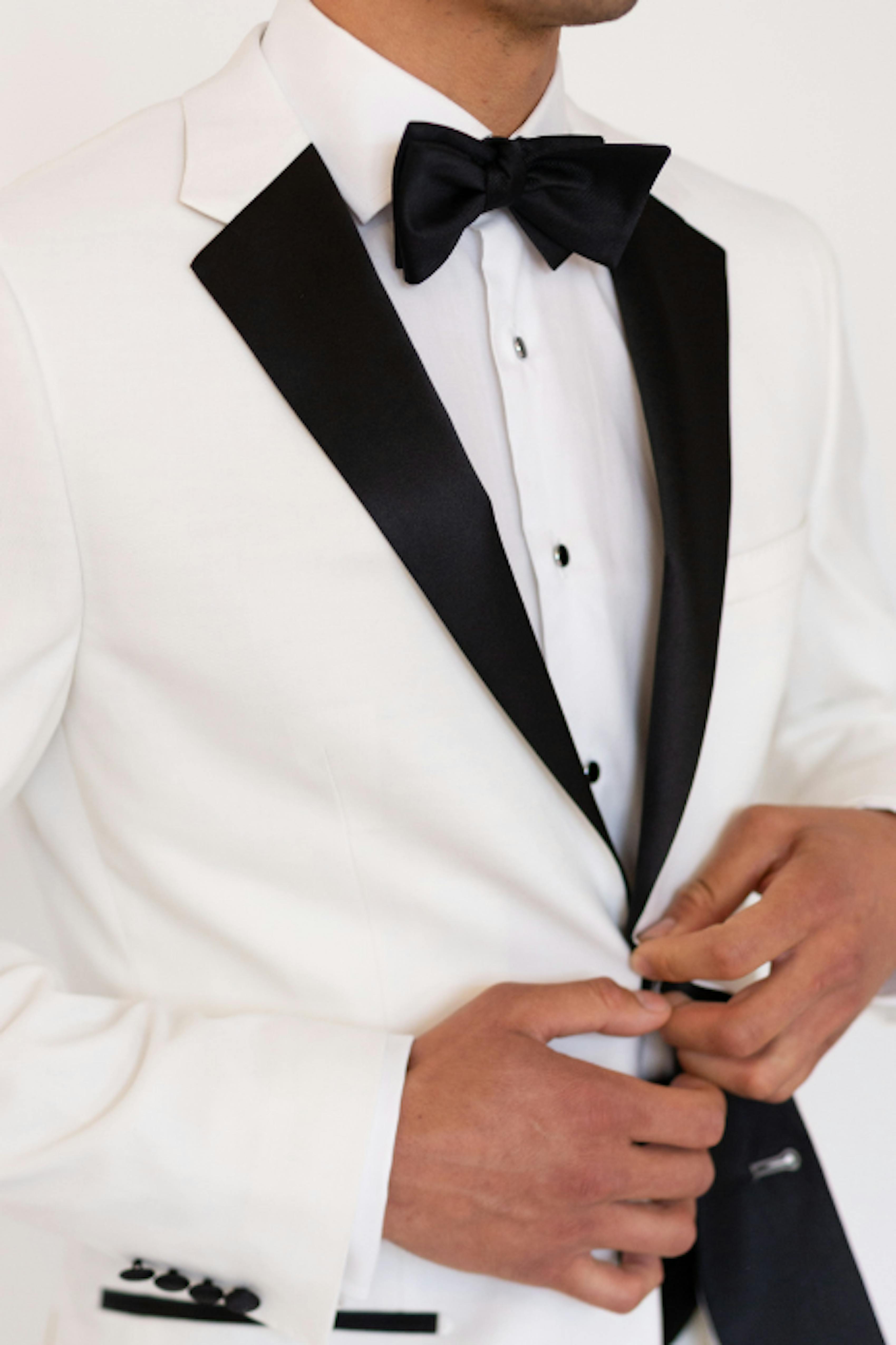 White prom tuxedo with black lapels