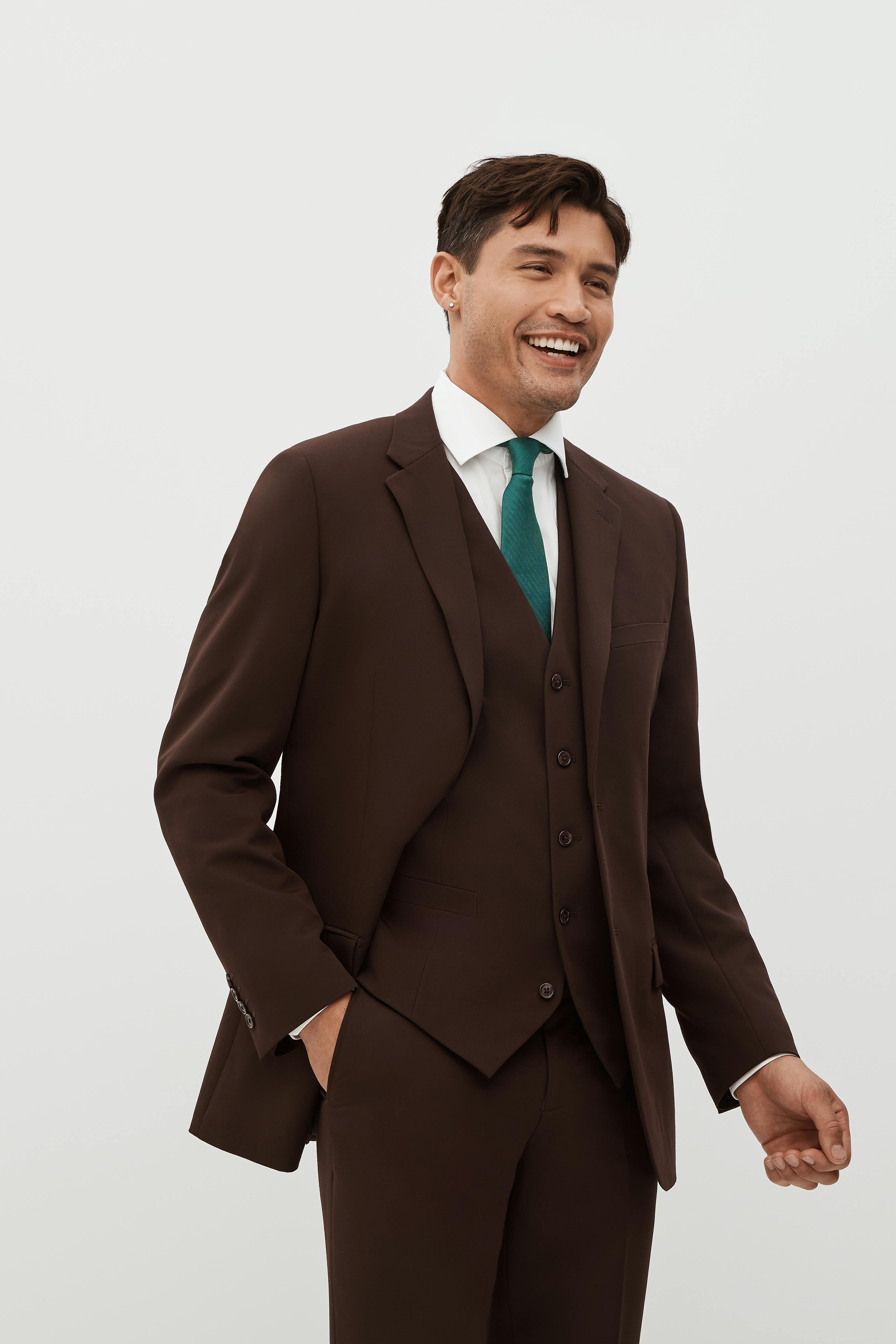 Brown wedding suit with dark sage green tie