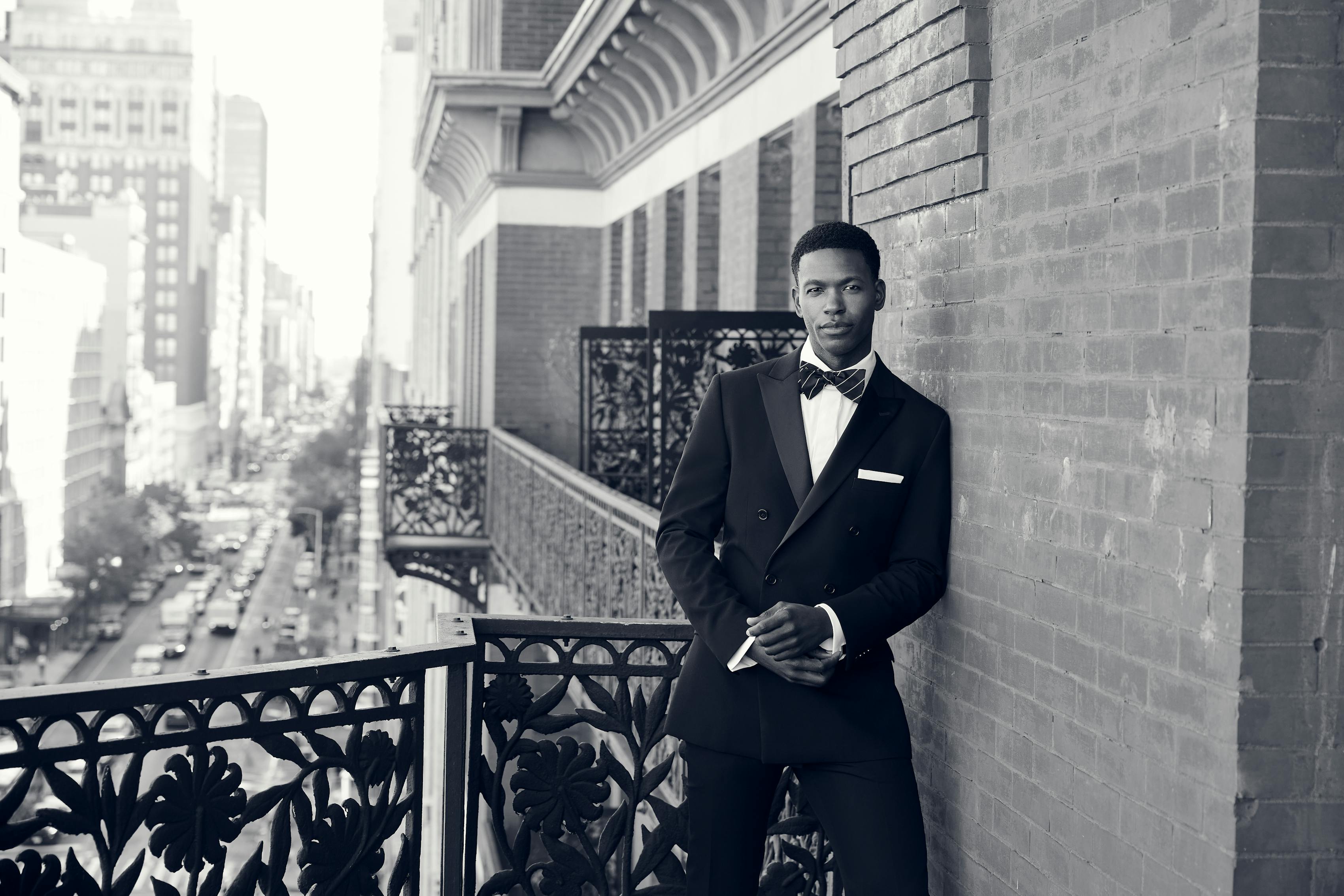 Men's black-tie outfit for 2025 with double breasted tuxedo and patterned bow tie
