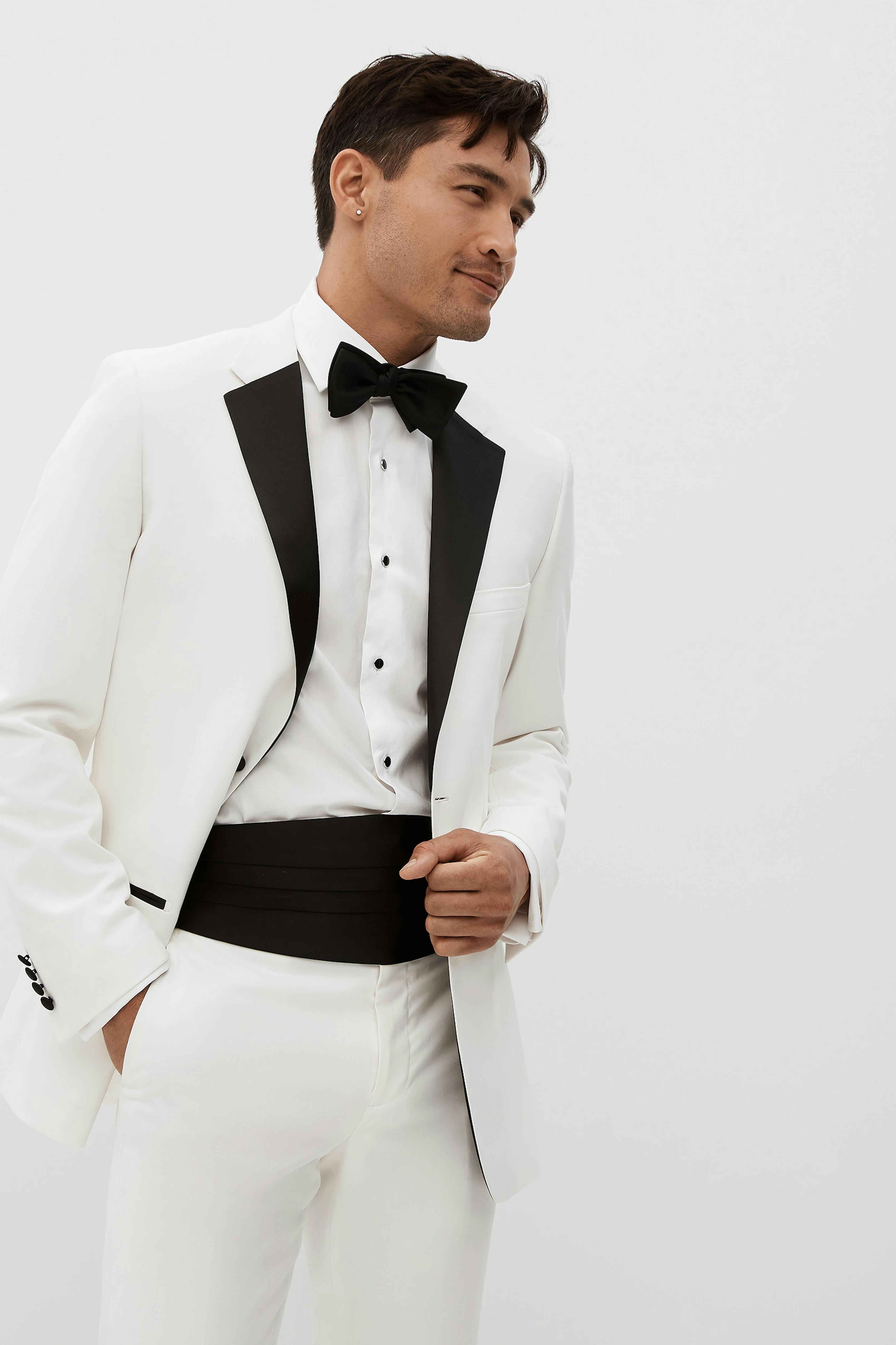 White wedding tuxedo for groom with classic black lapel
