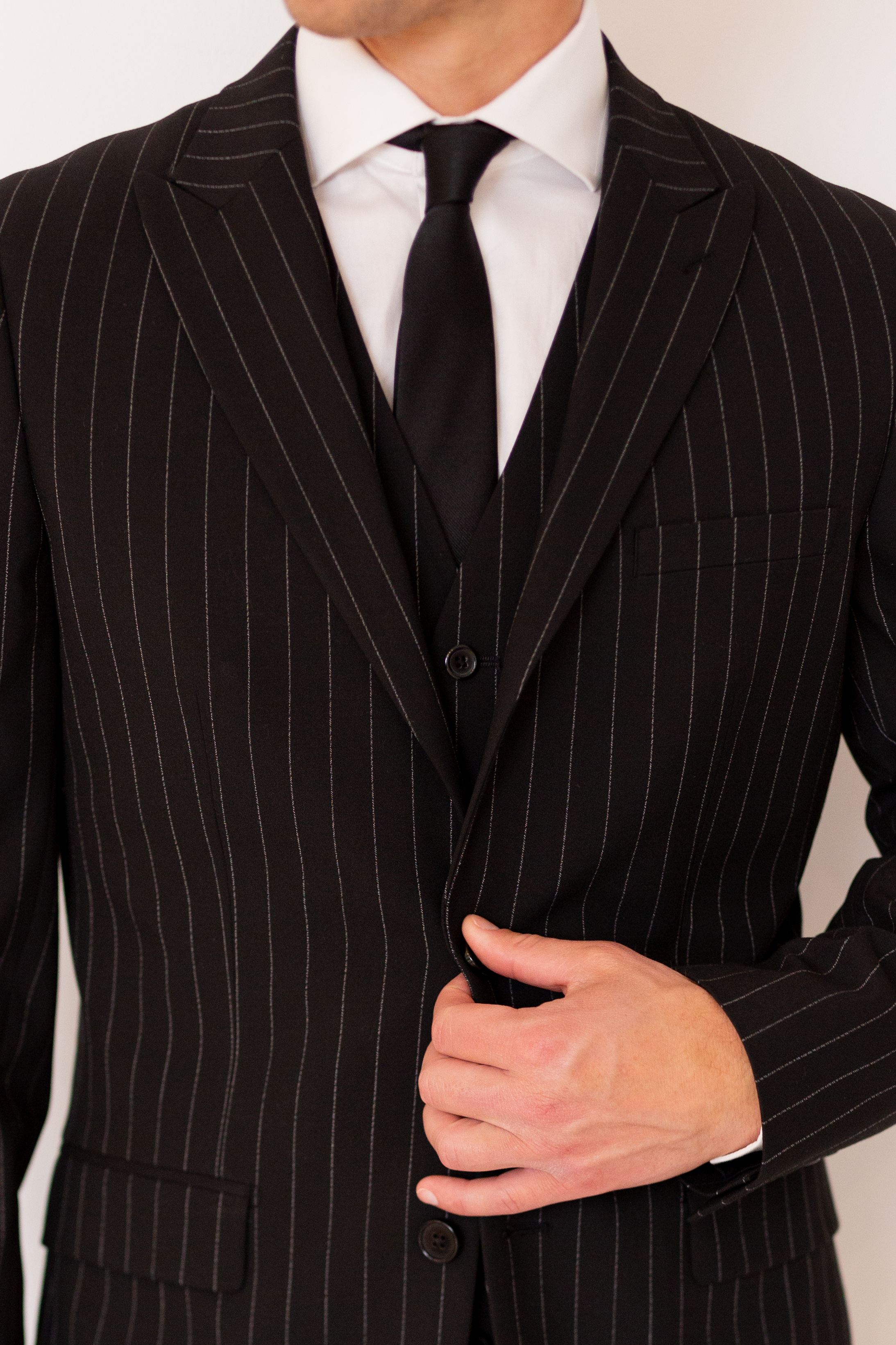Black pinstripe suit for guys at prom