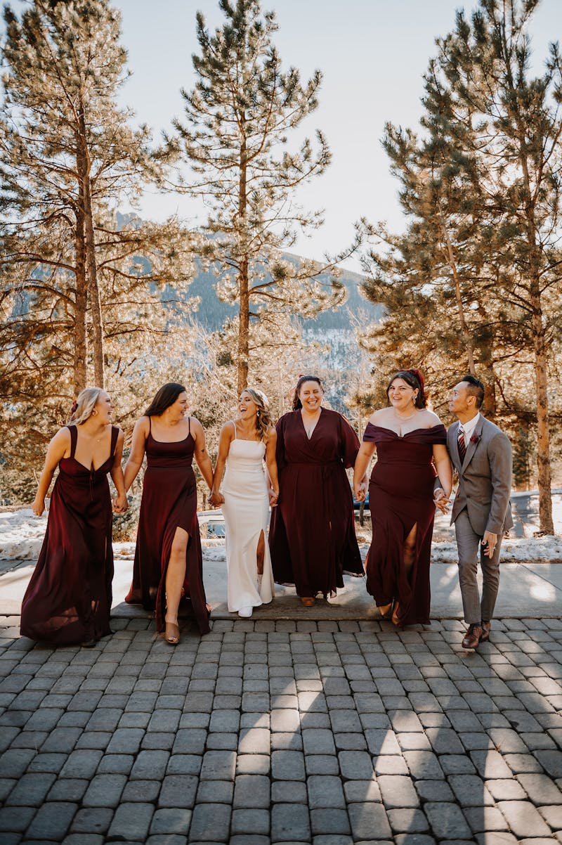 burgundy bridesmaids dresses for winter wedding in the mountains