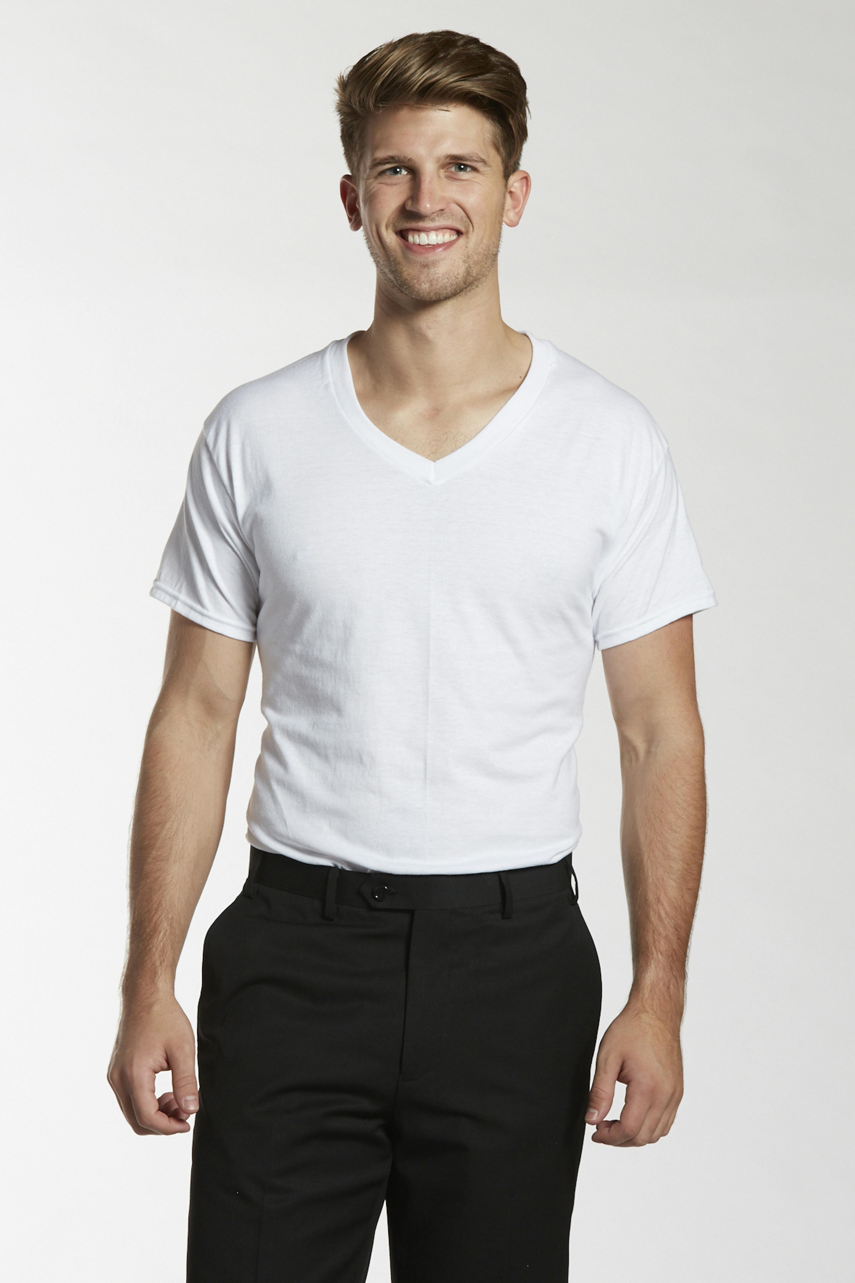 Man wearing white V-neck undershirt for suit outfit.