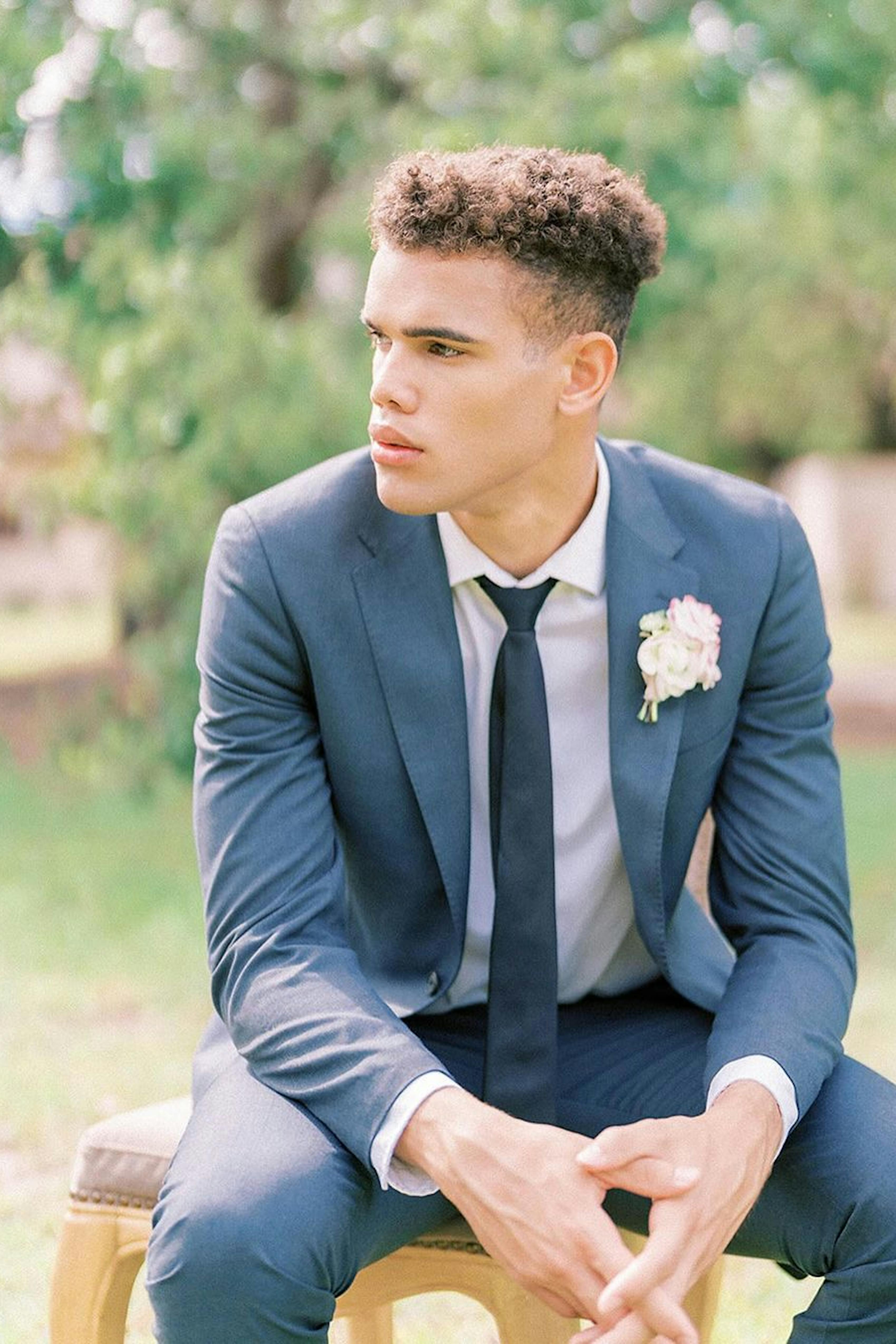 Men's light blue suit for an outdoor wedding in summer