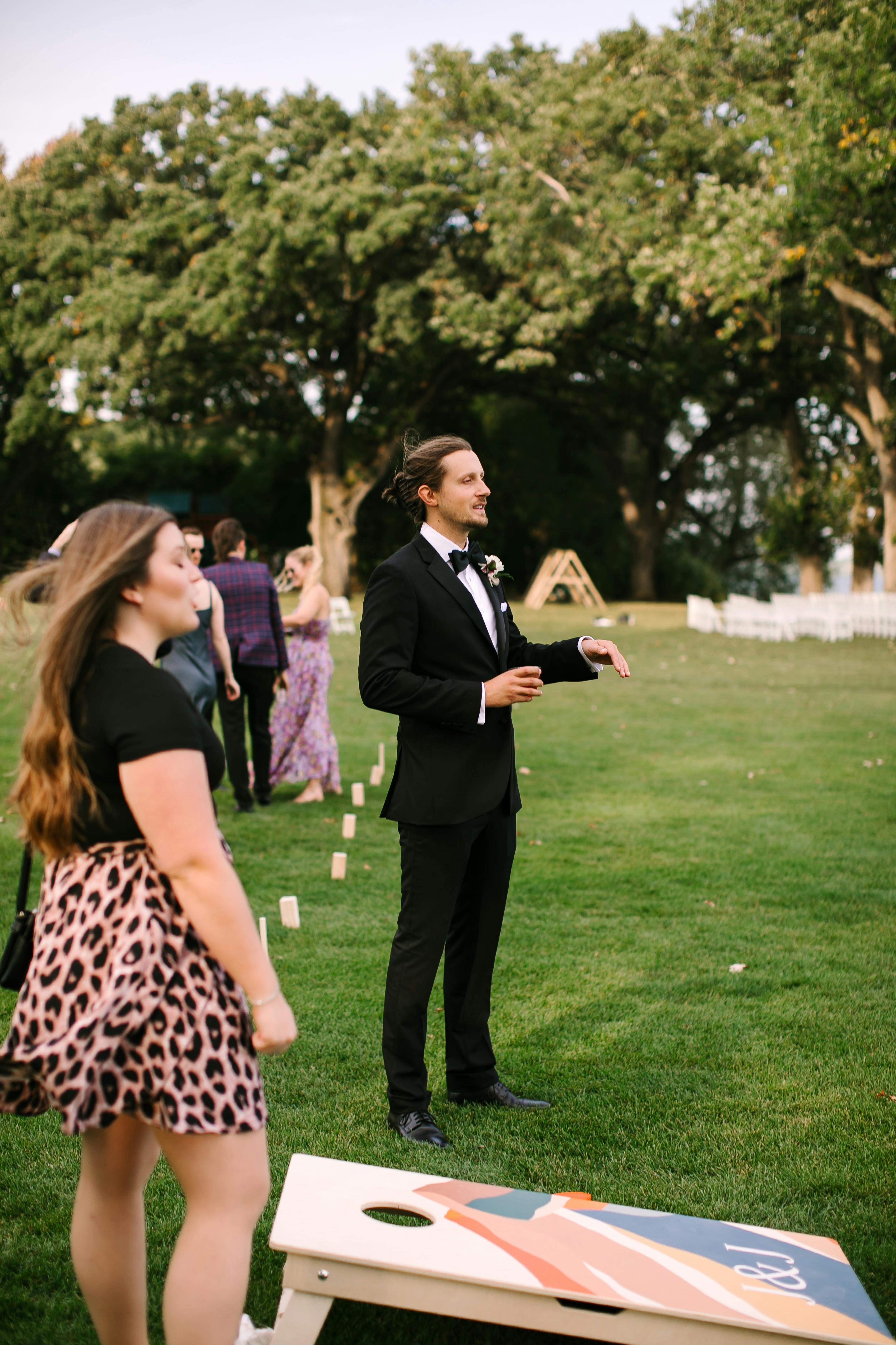 Wedding cornhole game customized with the initals of the bride and groom.
