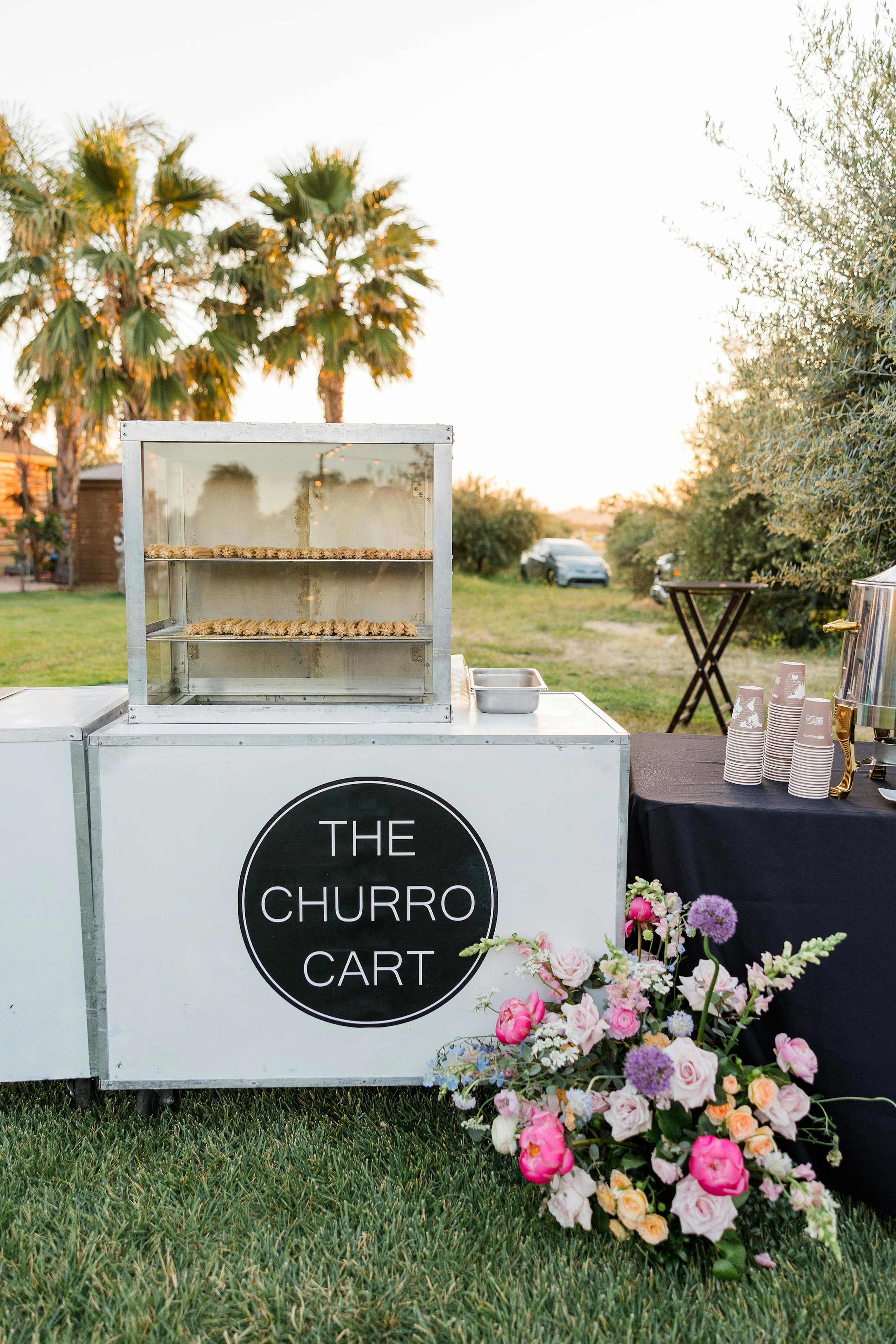 Churro cart wedding late night sweet snack.