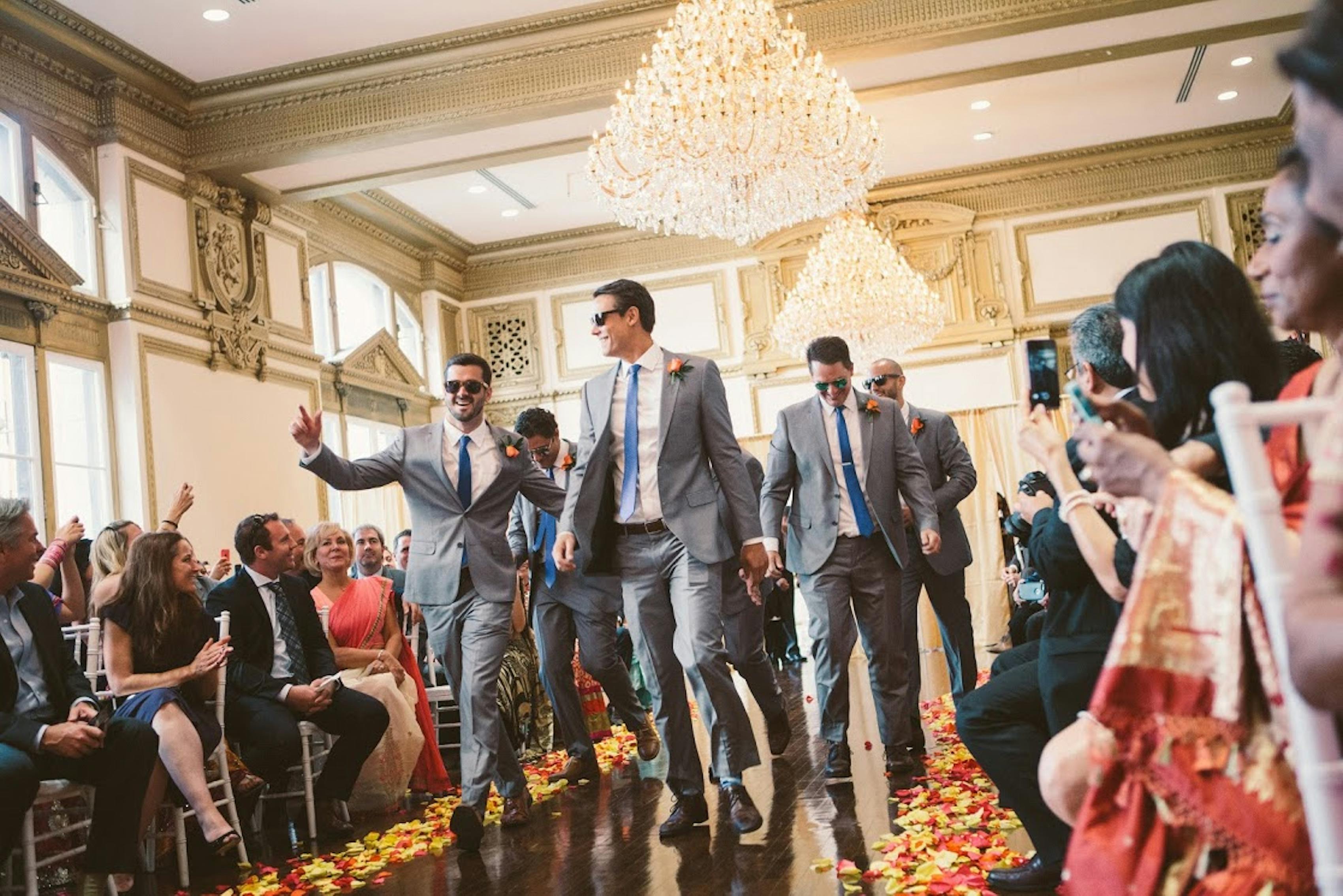 groomsmen in gray suits and brown shoes
