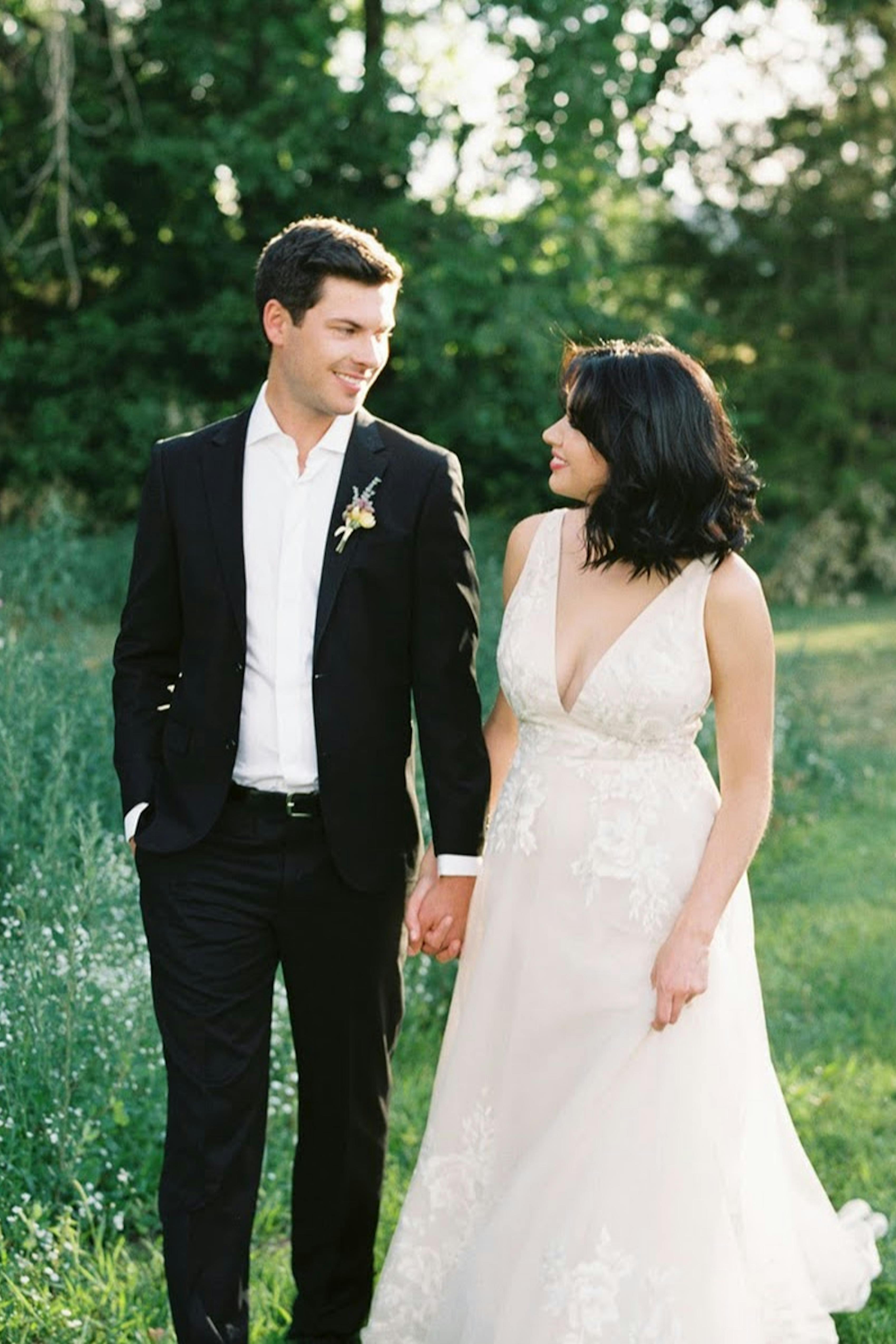 black suit casual backyard wedding