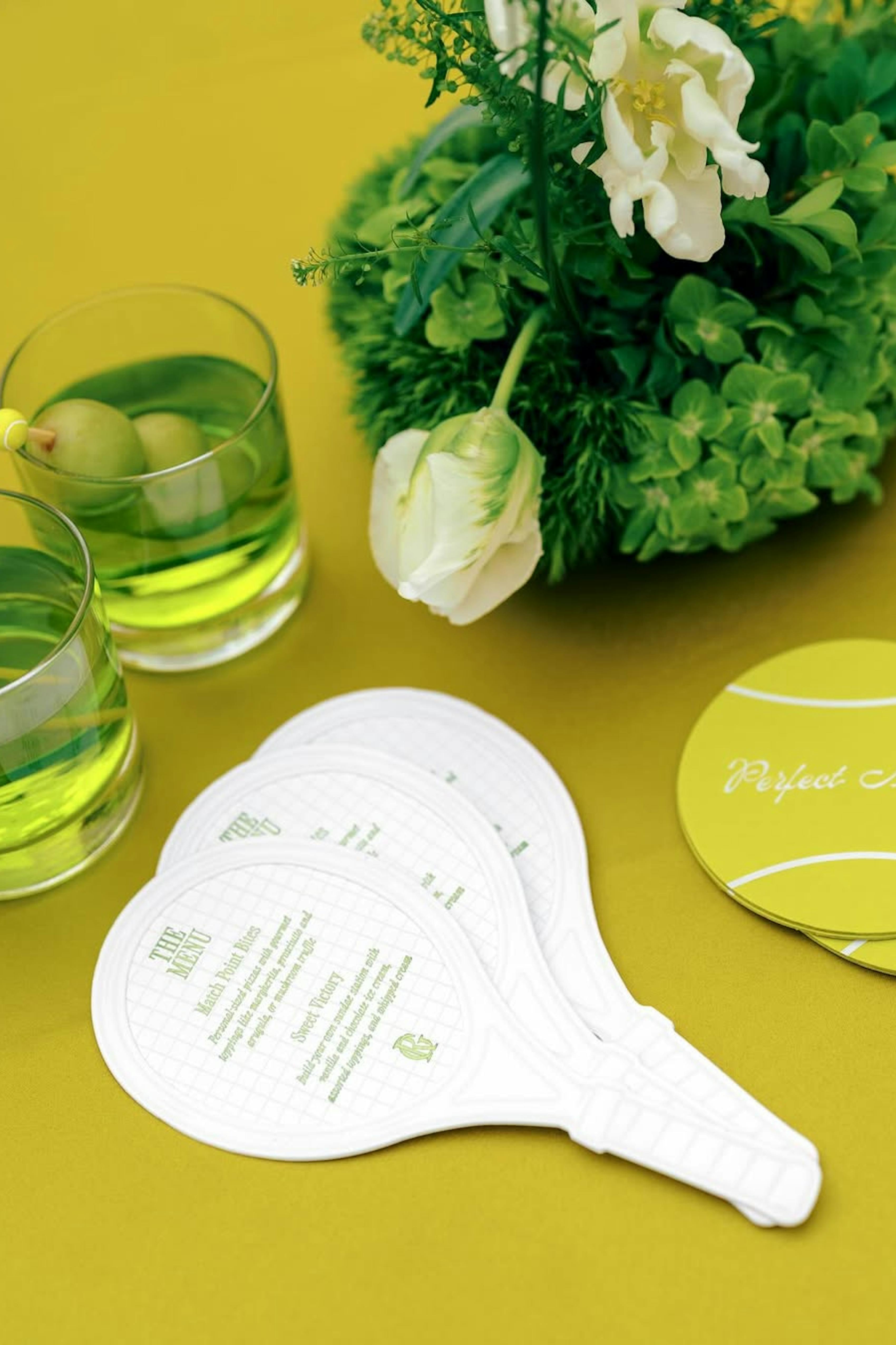 Wedding table decor and signature cocktails for tennis wedding theme