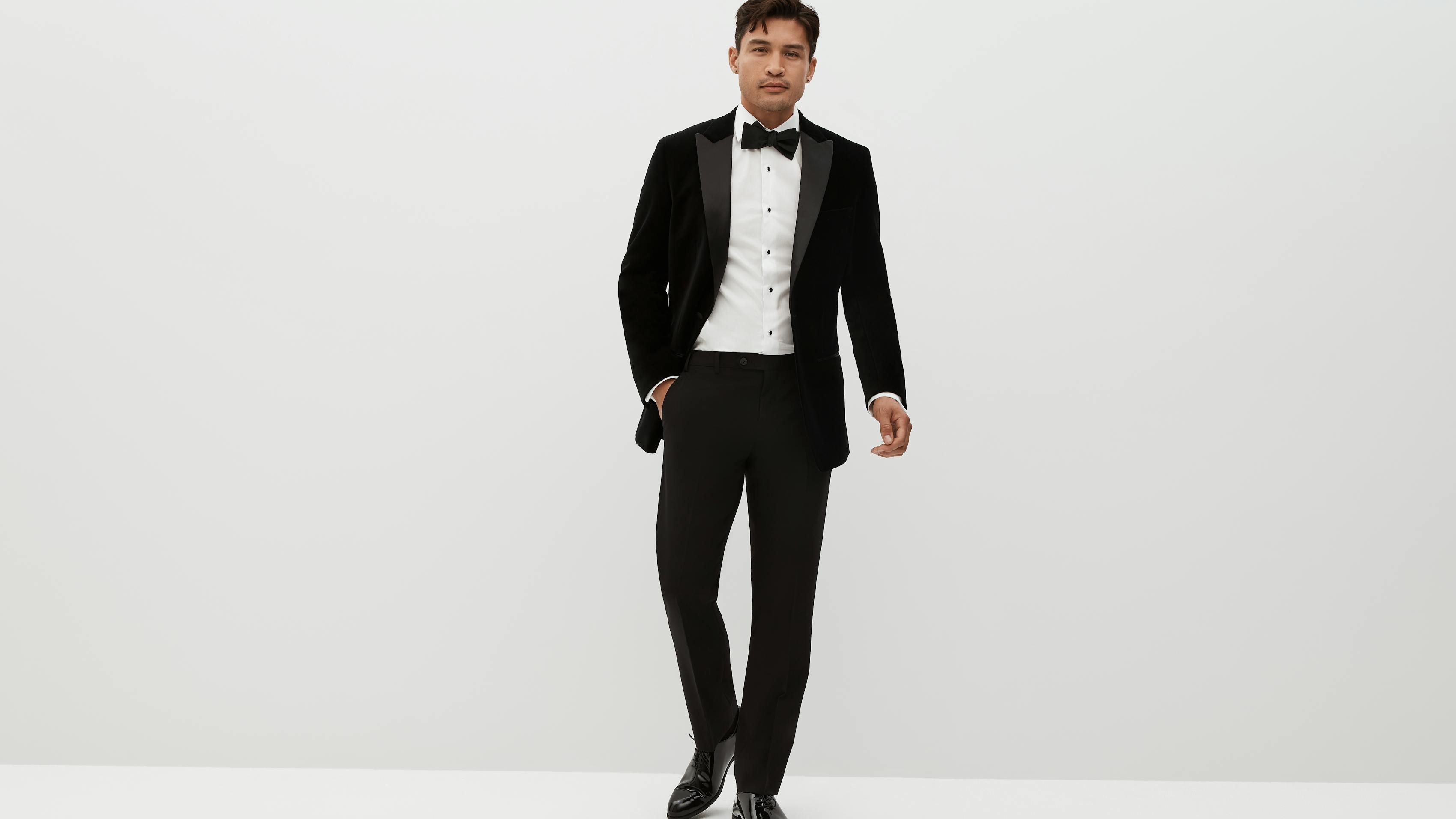 Classic black velvet tuxedo for men with white formal dress shirt for black tie event
